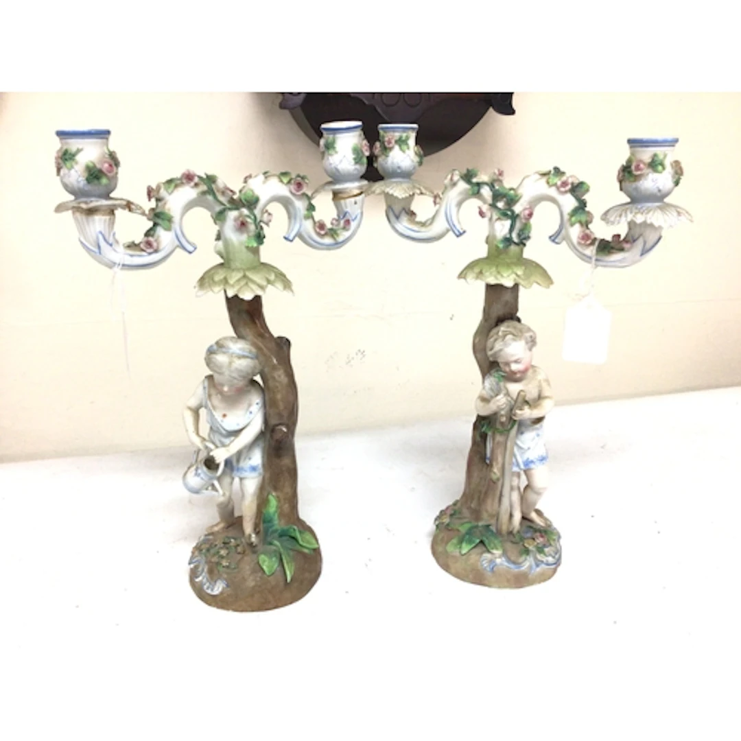 A pair of late 19th century German Porcelain candelabra of n...