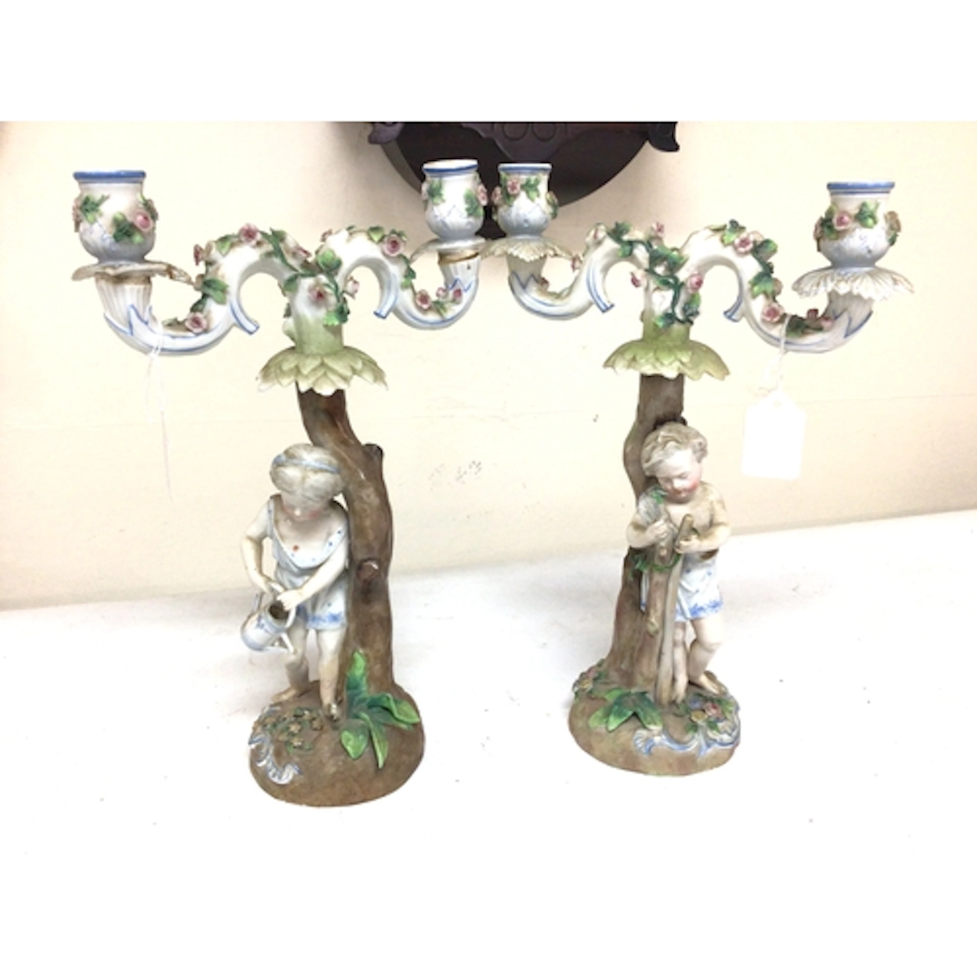 A pair of late 19th century German Porcelain candelabra of n...