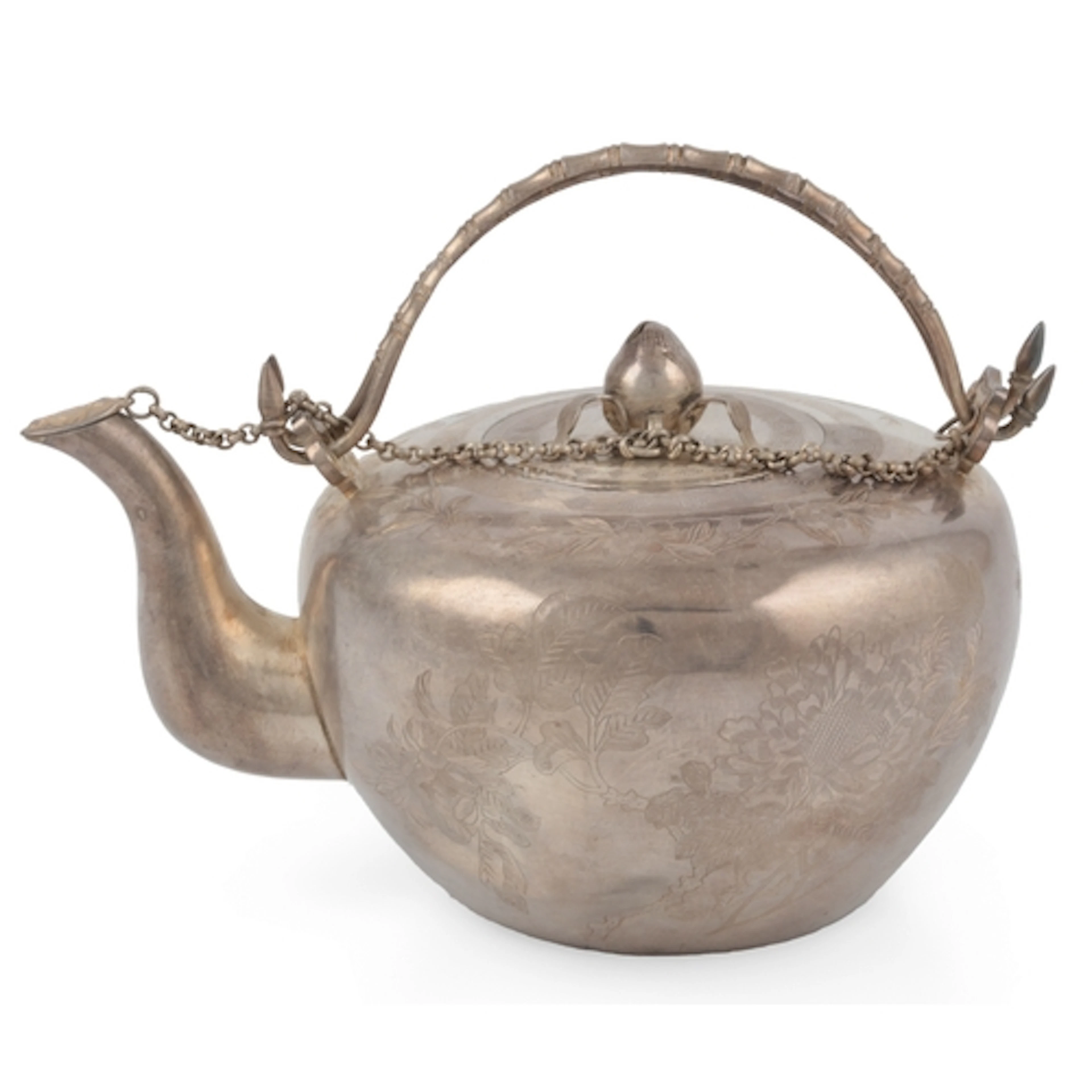 A Chinese silver teapot, early 20th century, of compressed o...
