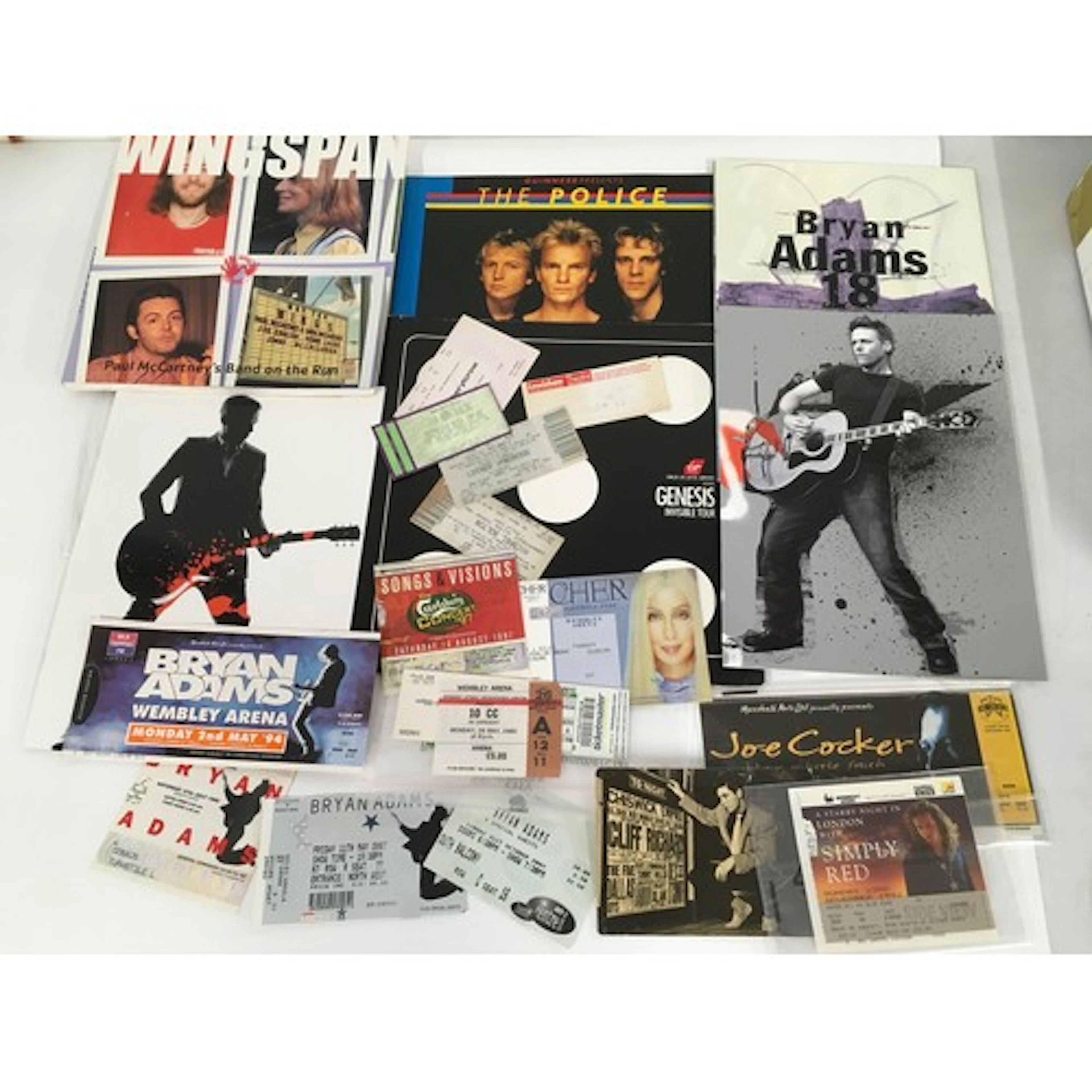 A collection of concert programs and tickets for various art...