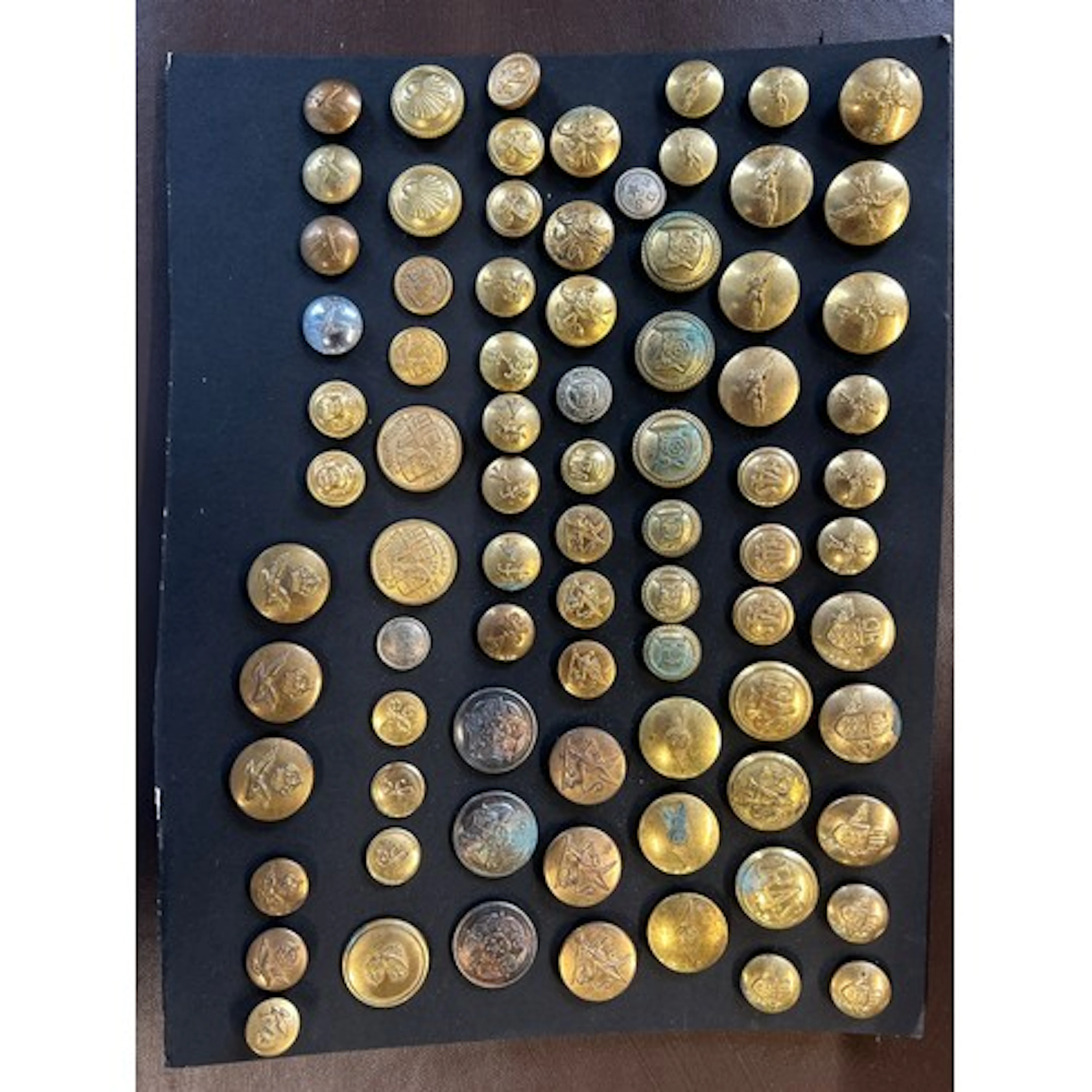 A carded selection of scarce, mainly civilian uniform button...