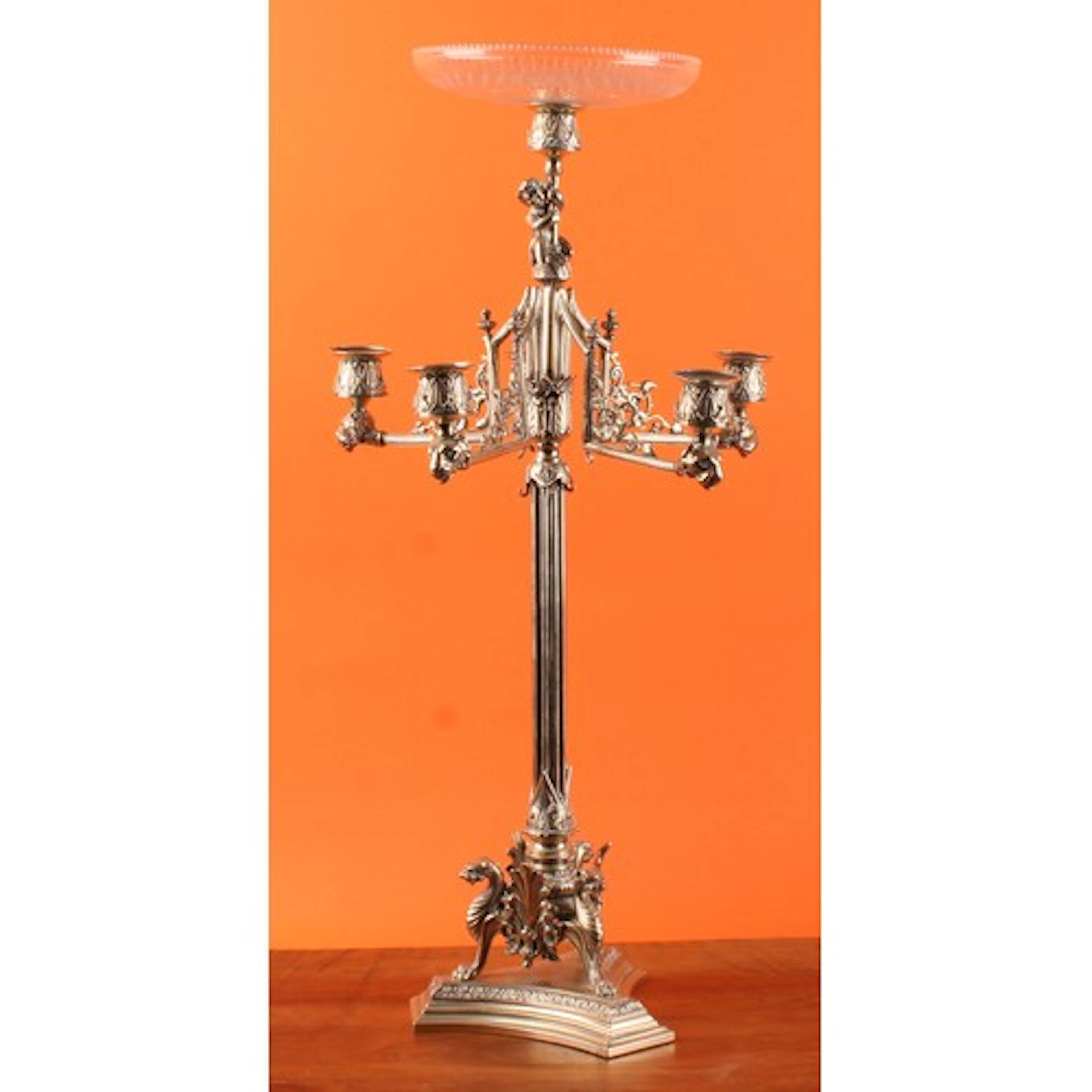 An early 20th century silver plated and cut glass five-branc...