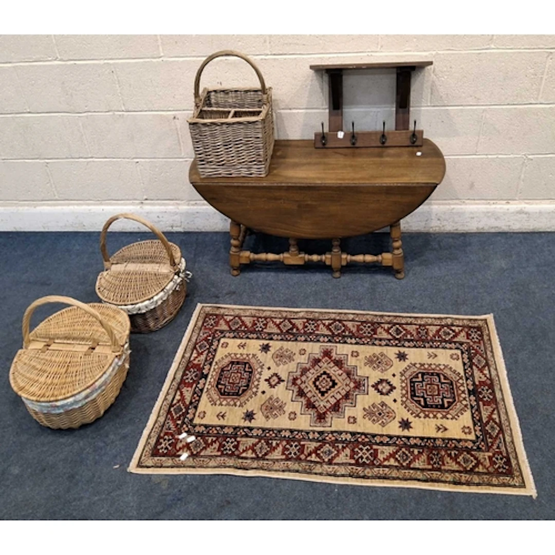 A 20TH CENTURY SMALL GATE LEG TABLE, raised on block and tur...
