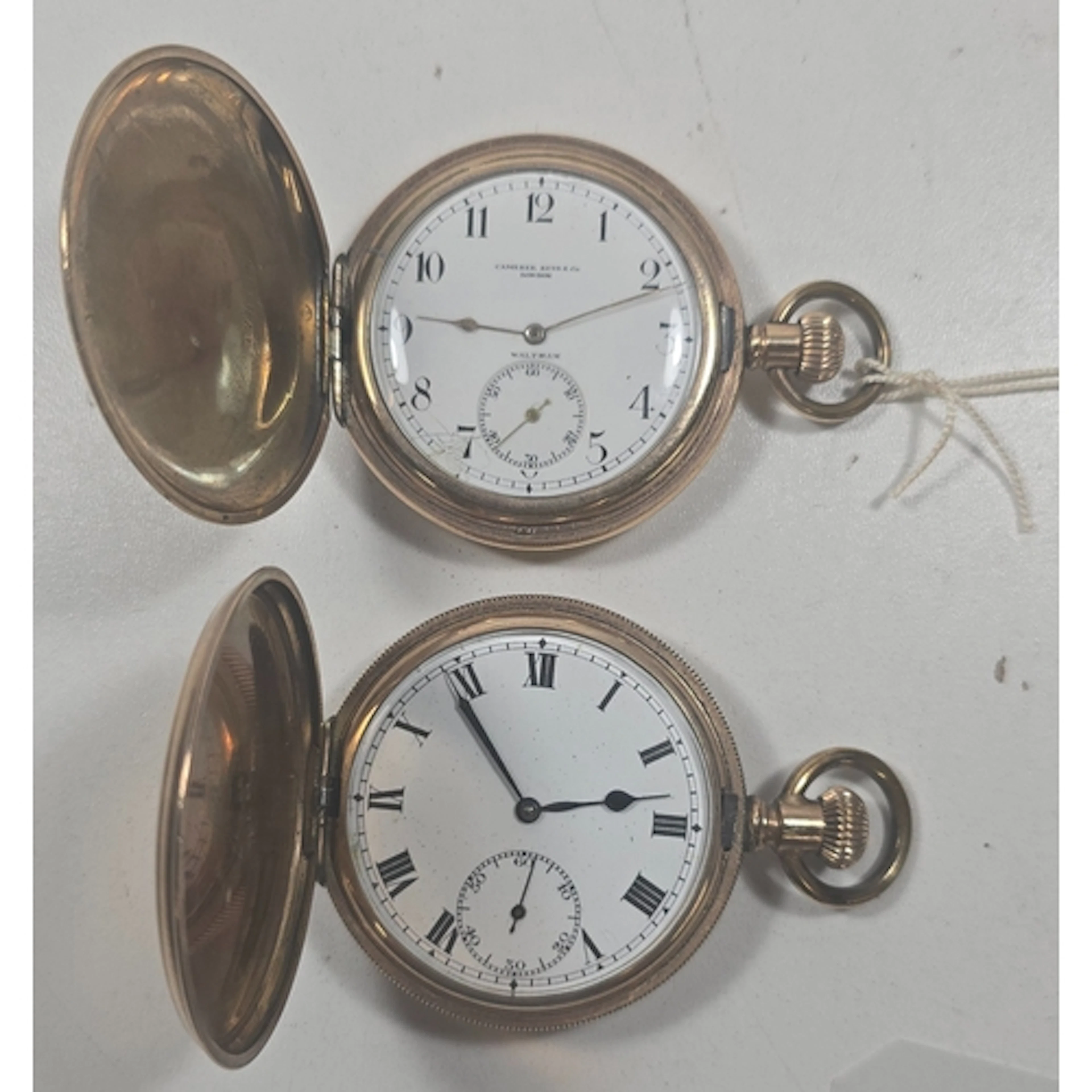Two Hunter gold-plated pocket watches: American Hunter retai...