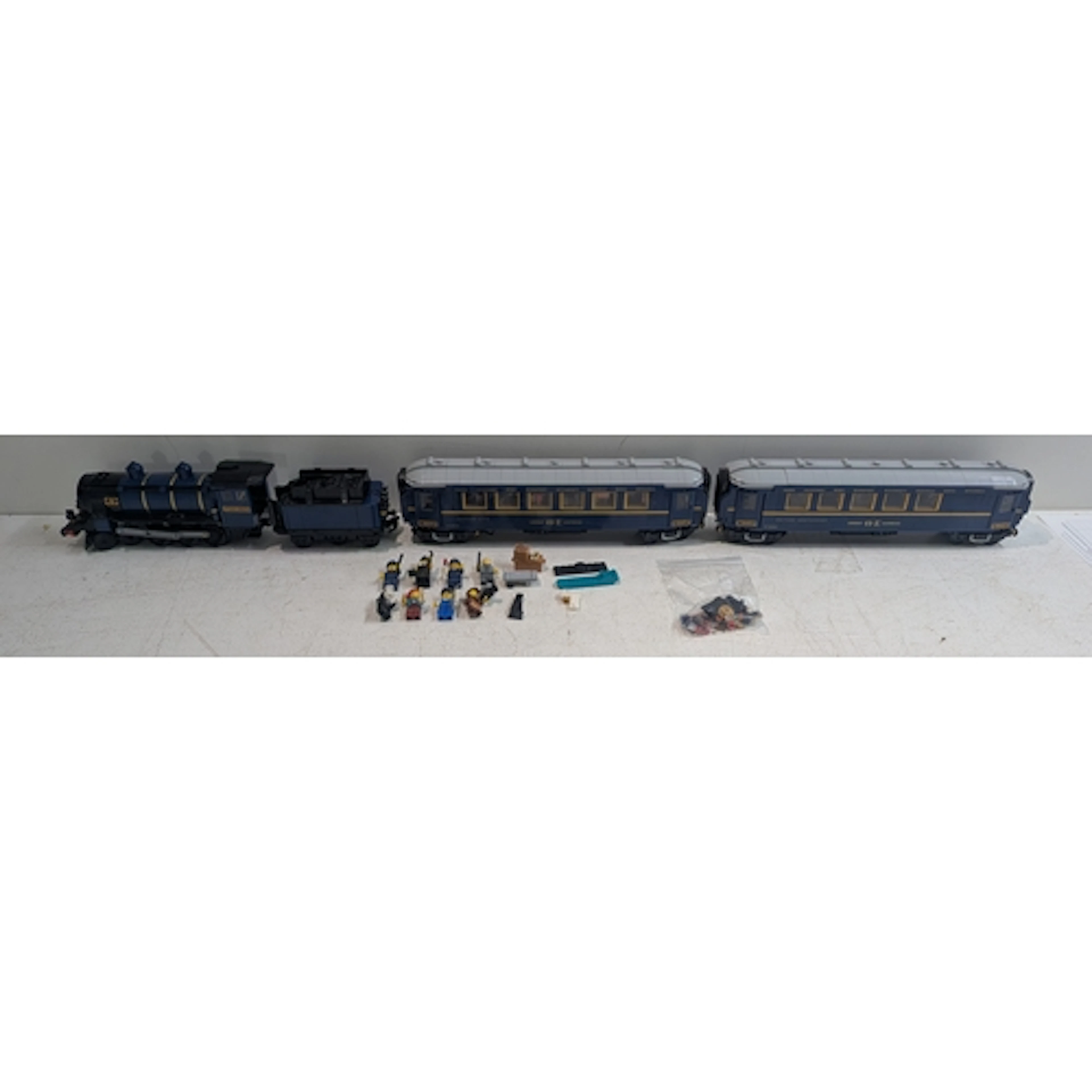 A Lego unboxed model of The Orient Express 21344 along with ...