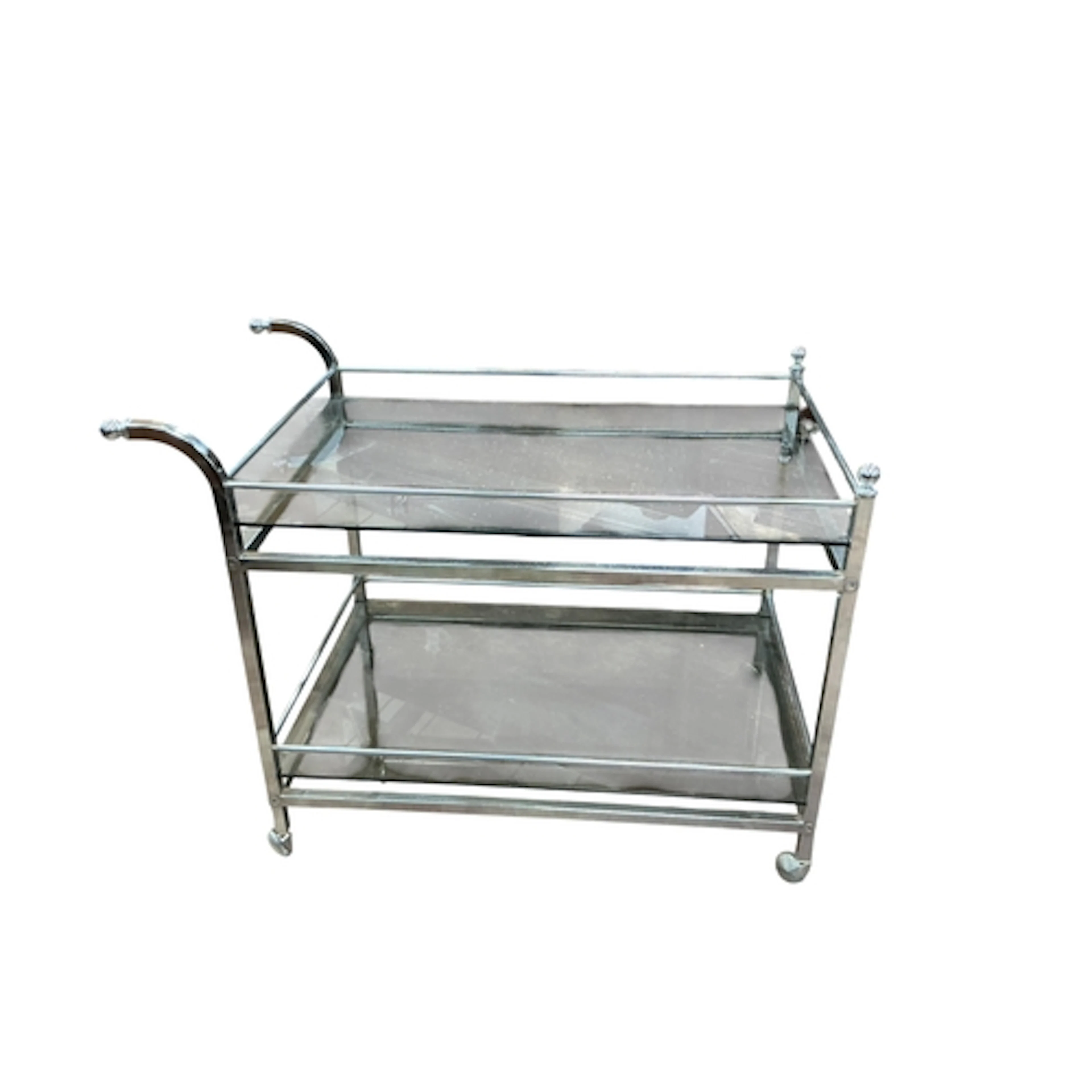 A 1980's glass and chrome drinks trolley, width 87cm, depth ...