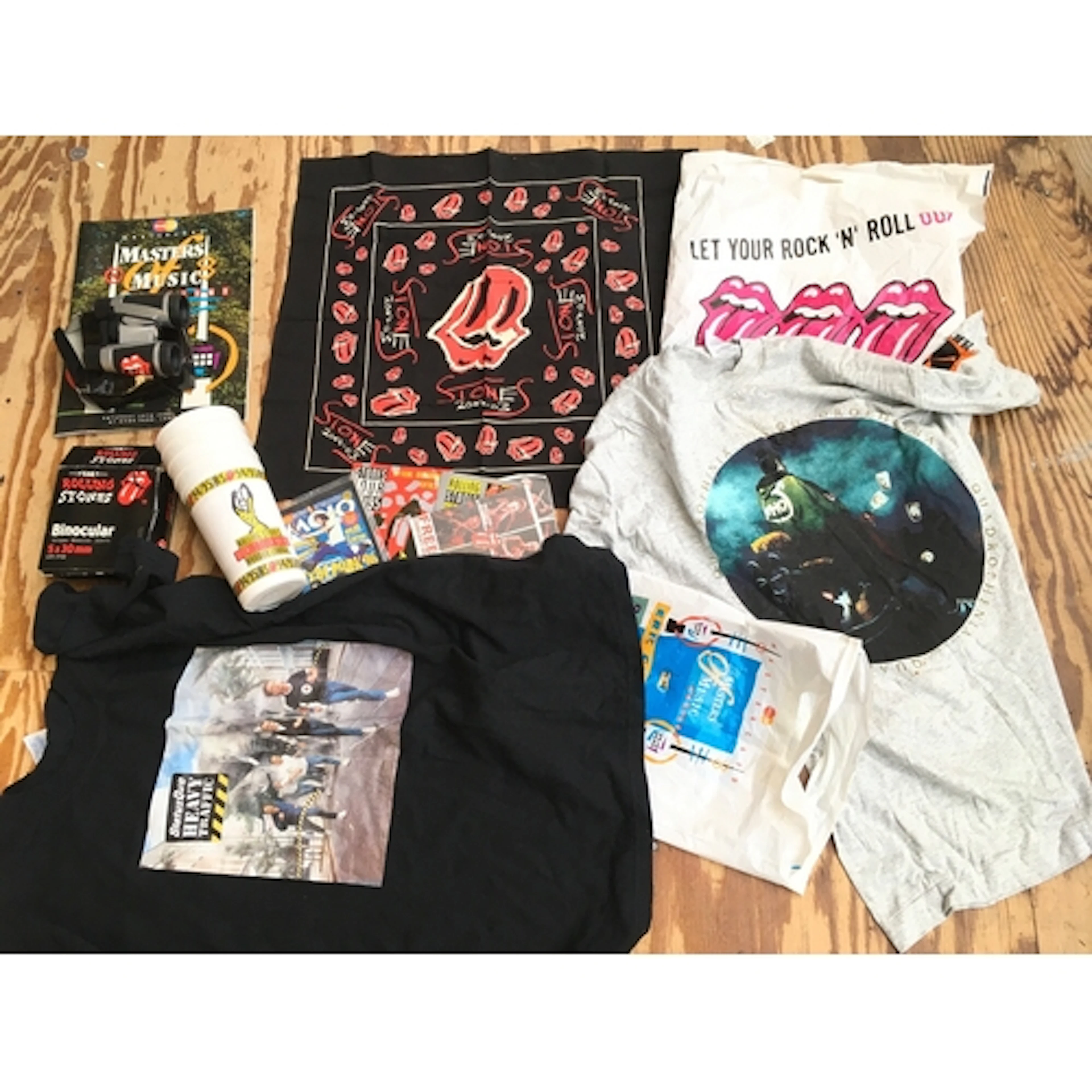 A collection of music memorabilia including Rolling Stones c...