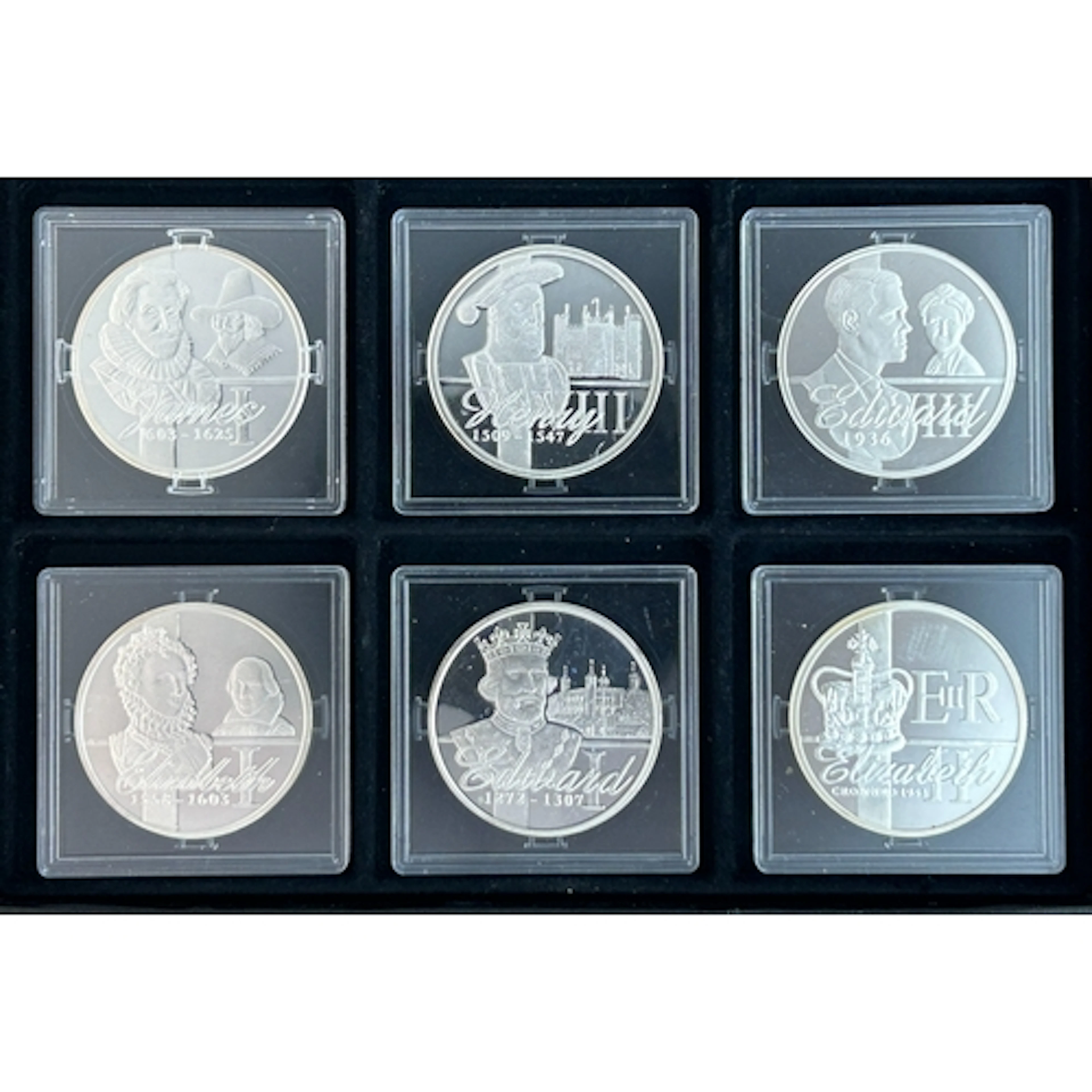 A group of six sterling silver commemorative medallions rela...