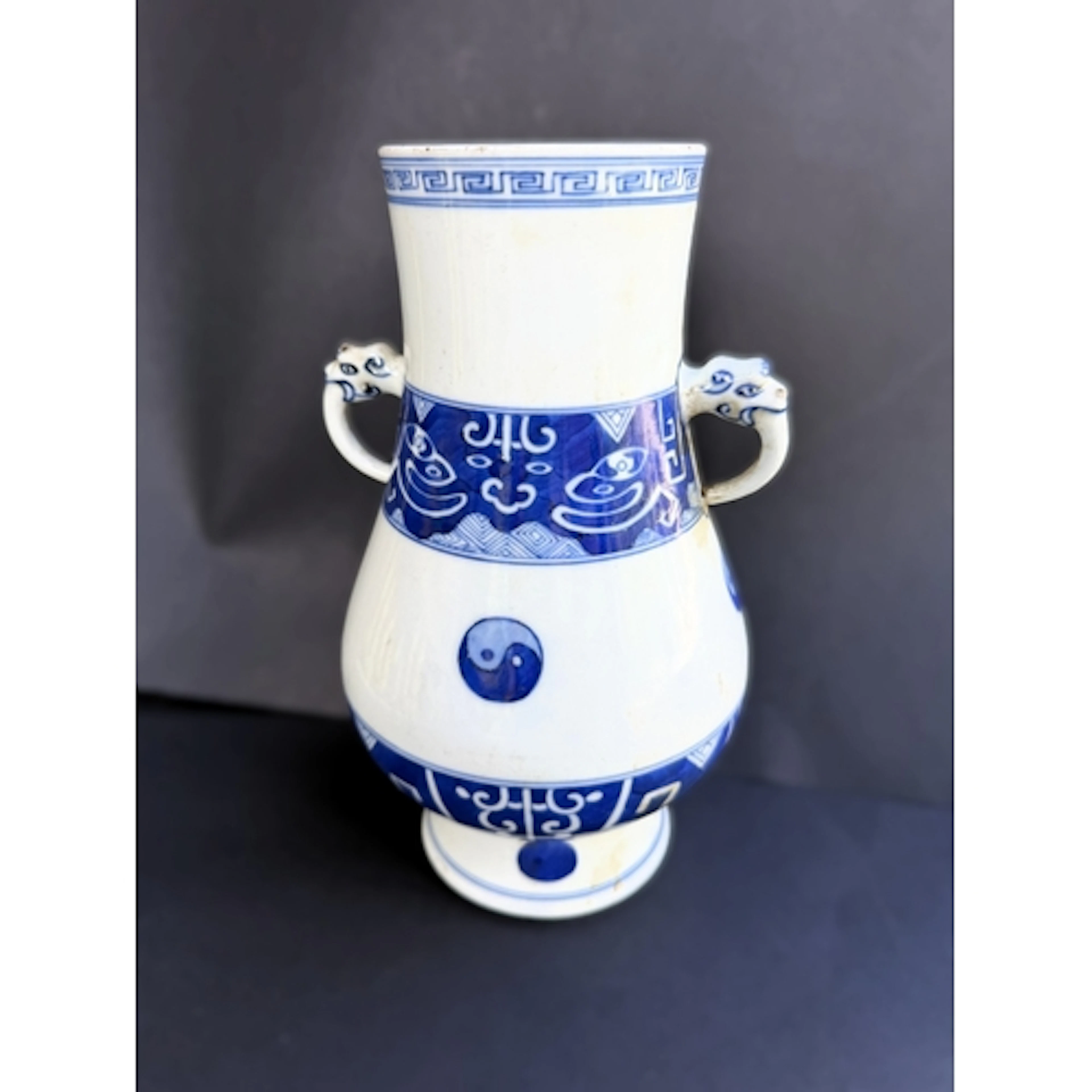 A Chinese blue and white pear shaped vase with slightly flar...