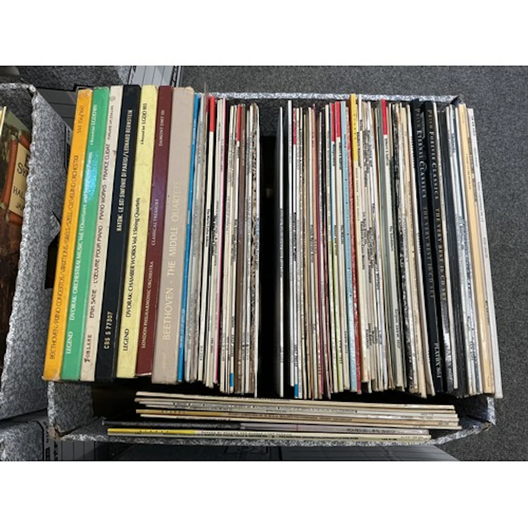 Four boxes of classical music LPs by various composers and a...