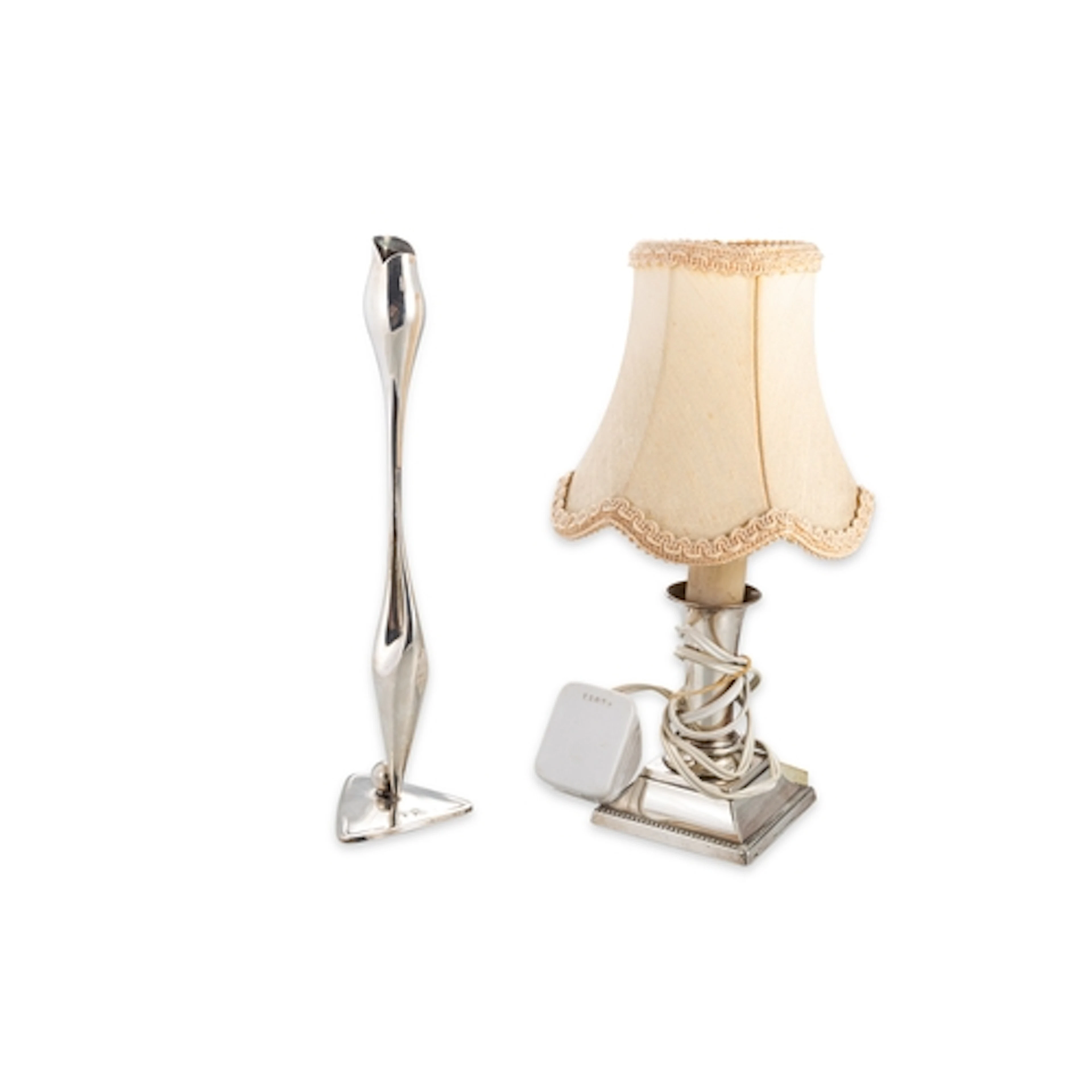 A SILVER TABLE LAMP, (electric) with an art nouveau style bu...