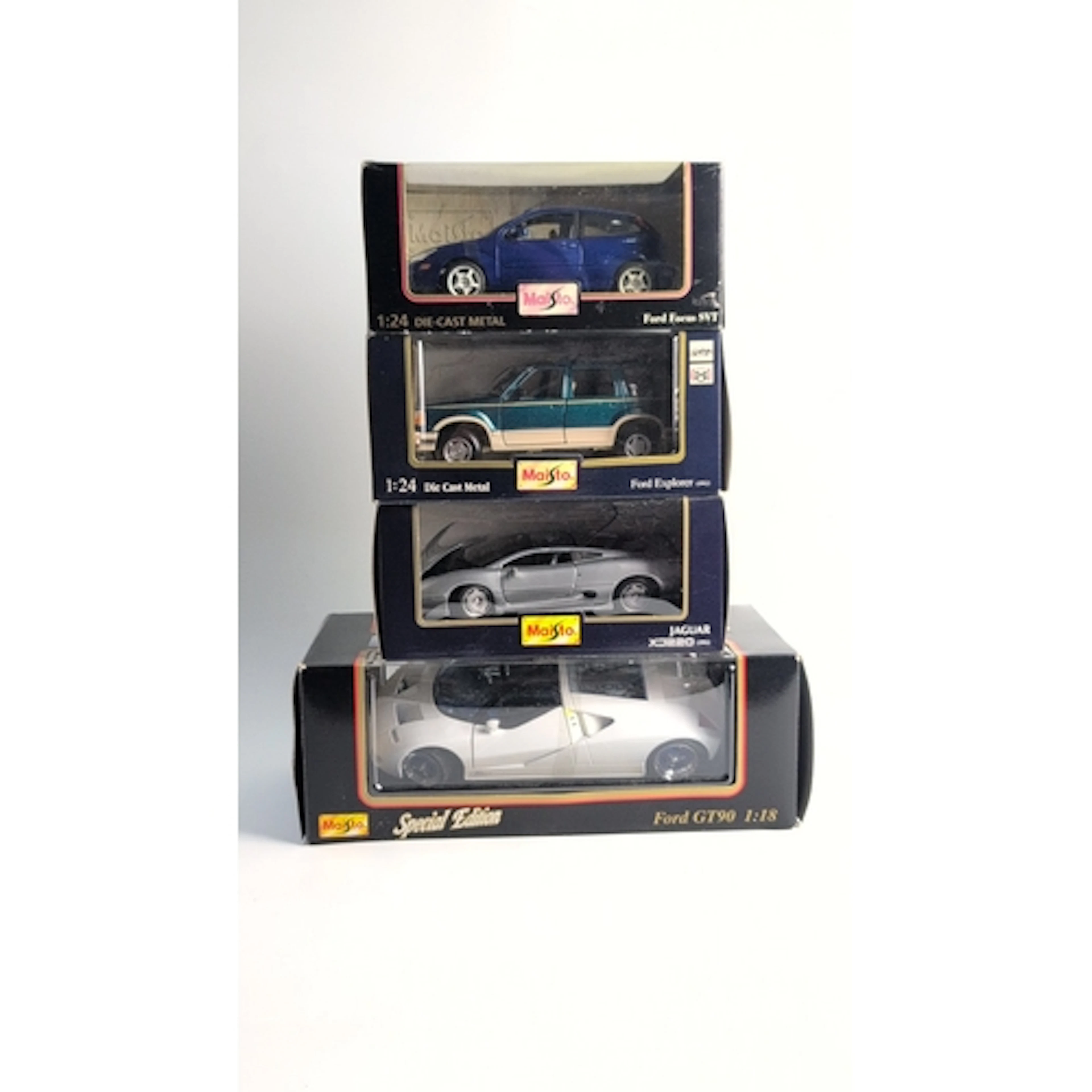 4 x Maisto die-cast model automobiles, boxed, comprising 1:2...