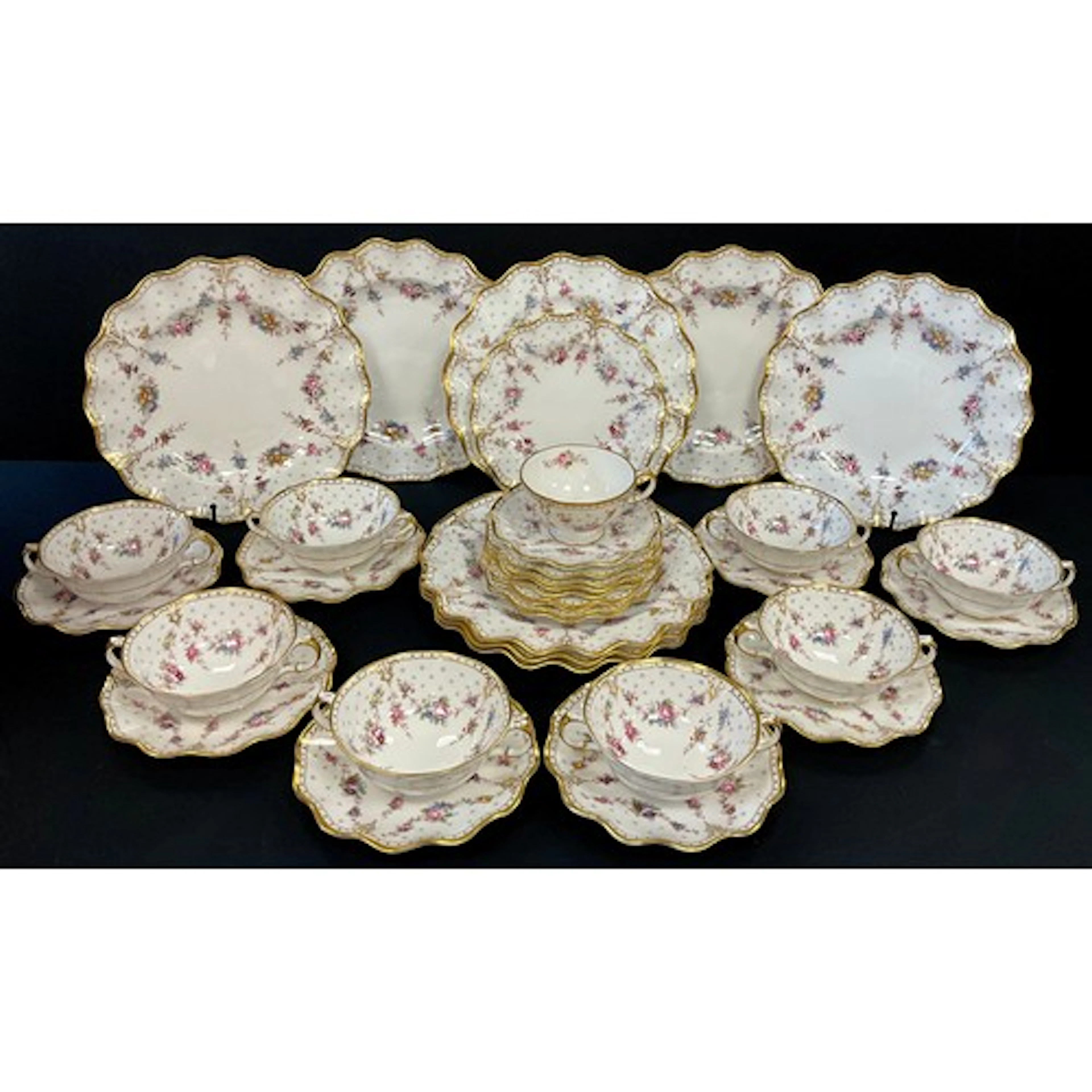 A Royal Crown Derby Royal Antoinette pattern table service i...