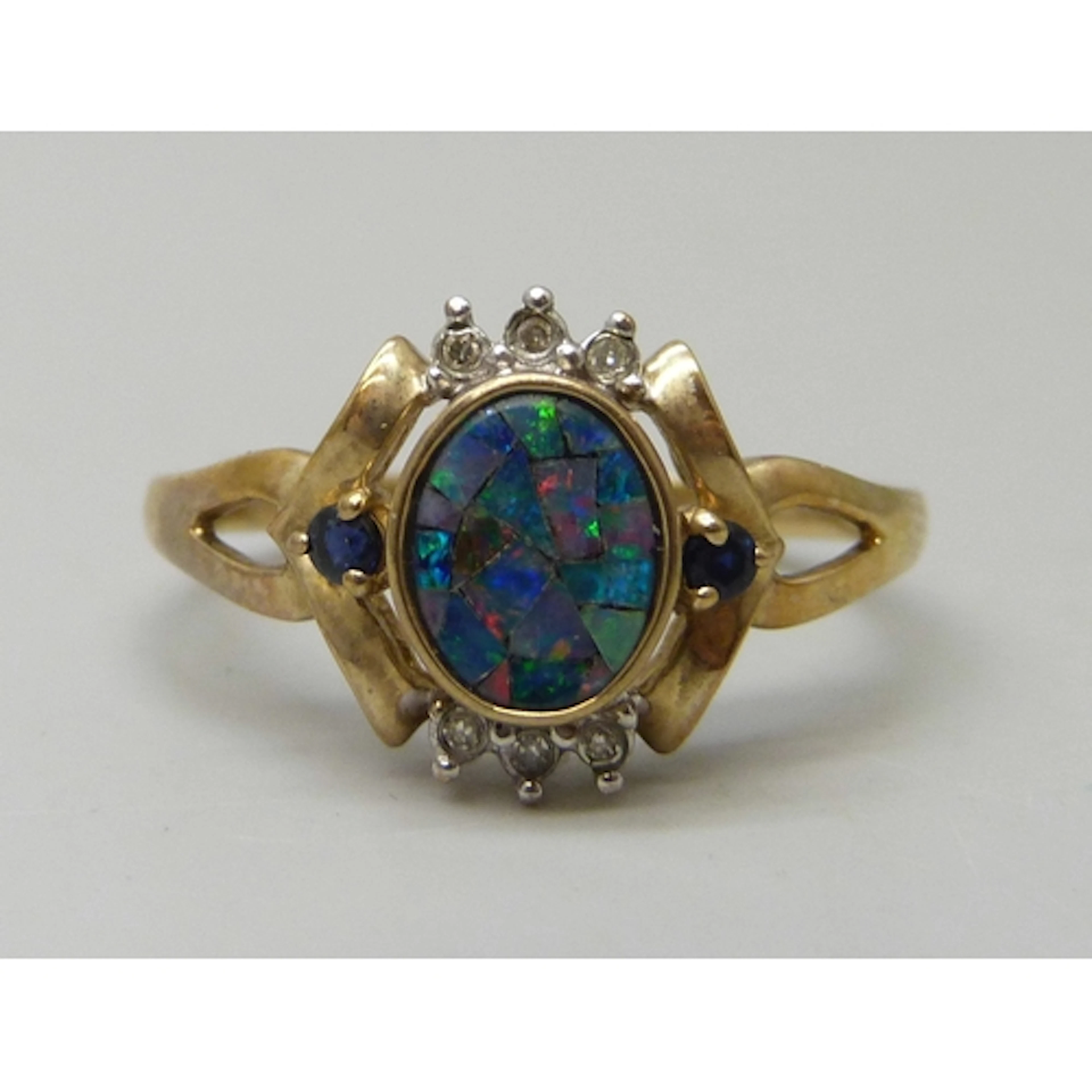 A 9ct gold mosaic opal, diamond and sapphire ring, 2.7g, T