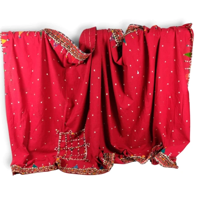 An Indian Banjara style embroidered shawl, with inset mirror...