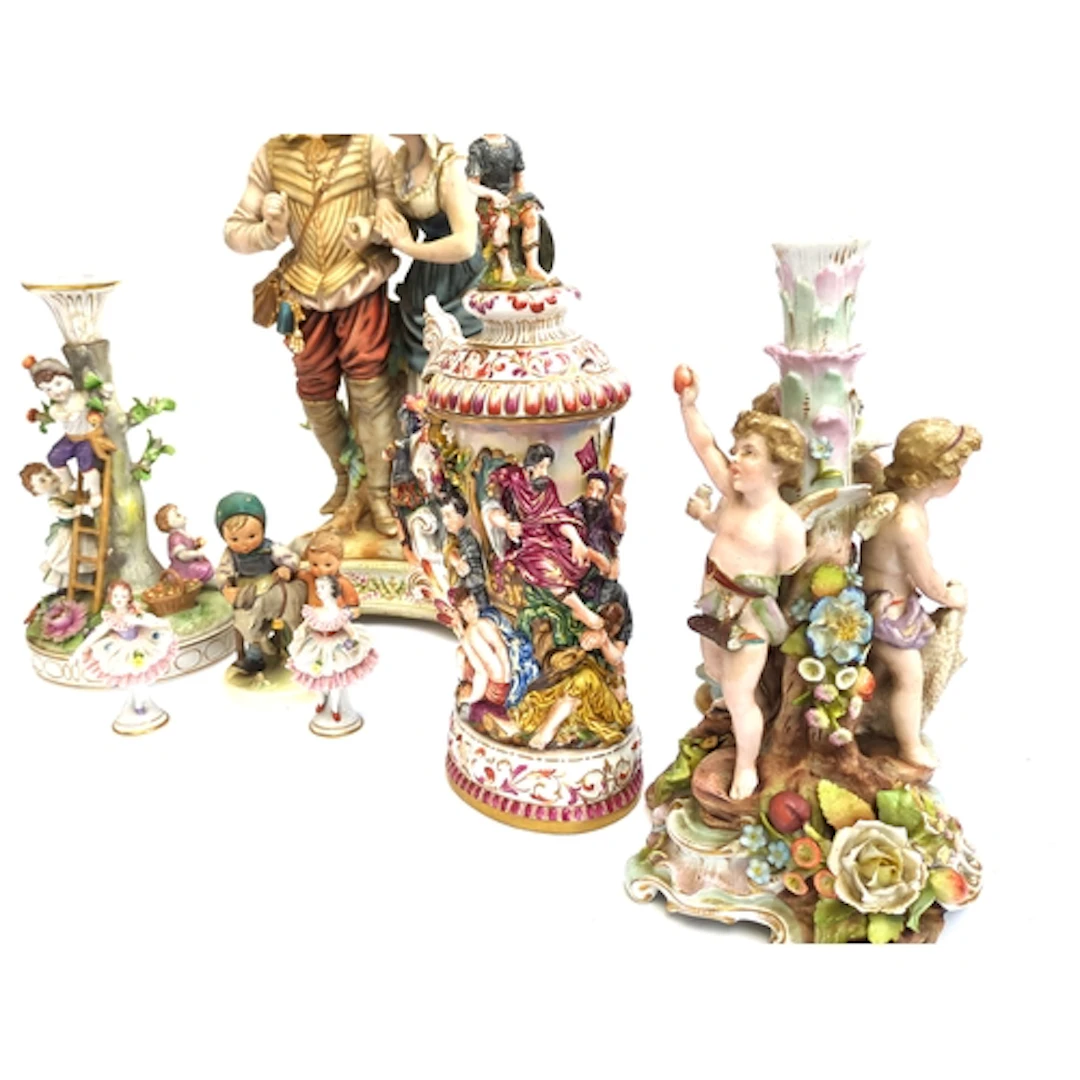 A collection of Continental ceramics to include: a pair of D...