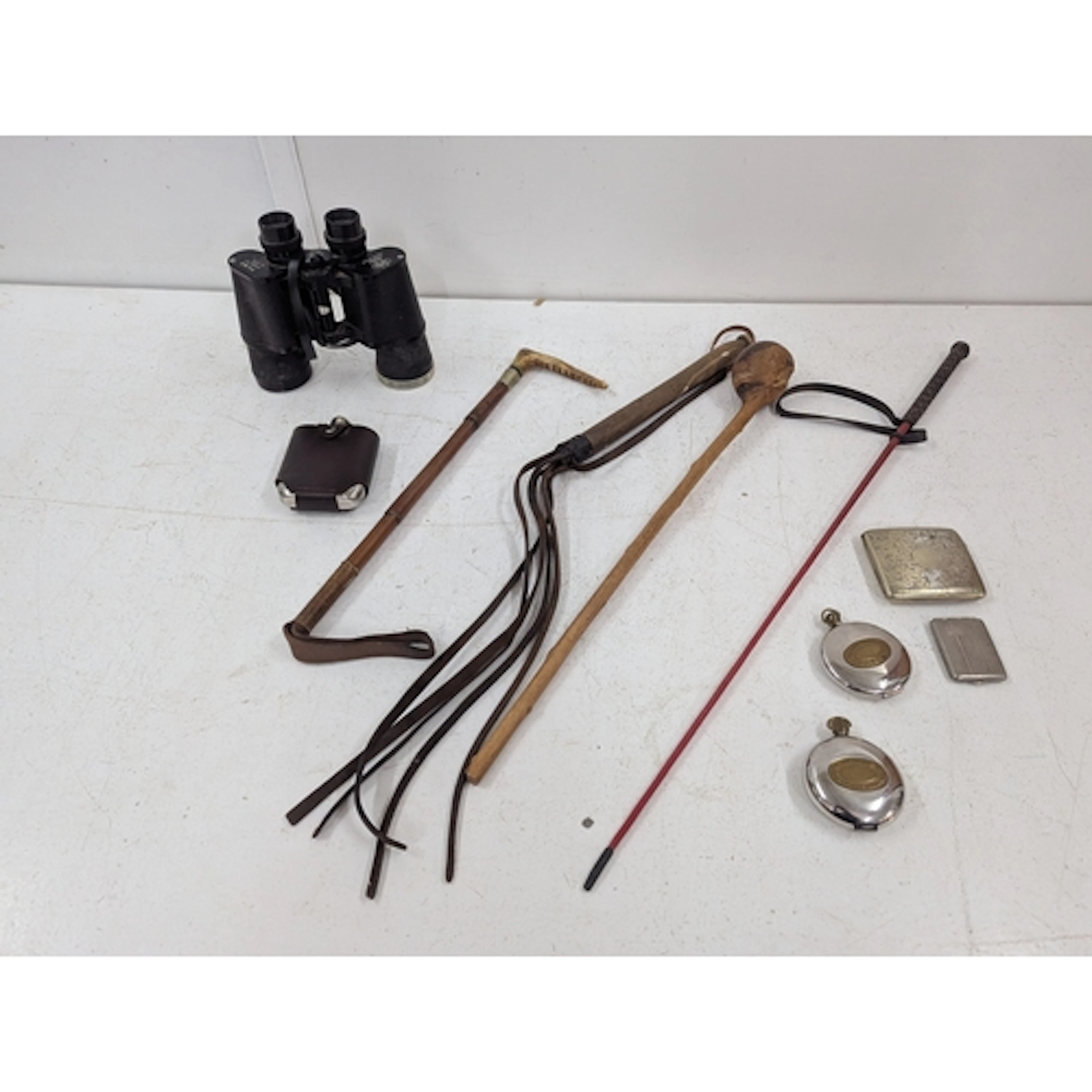 A mixed lot to include a pair of Carton binoculars, riding c...