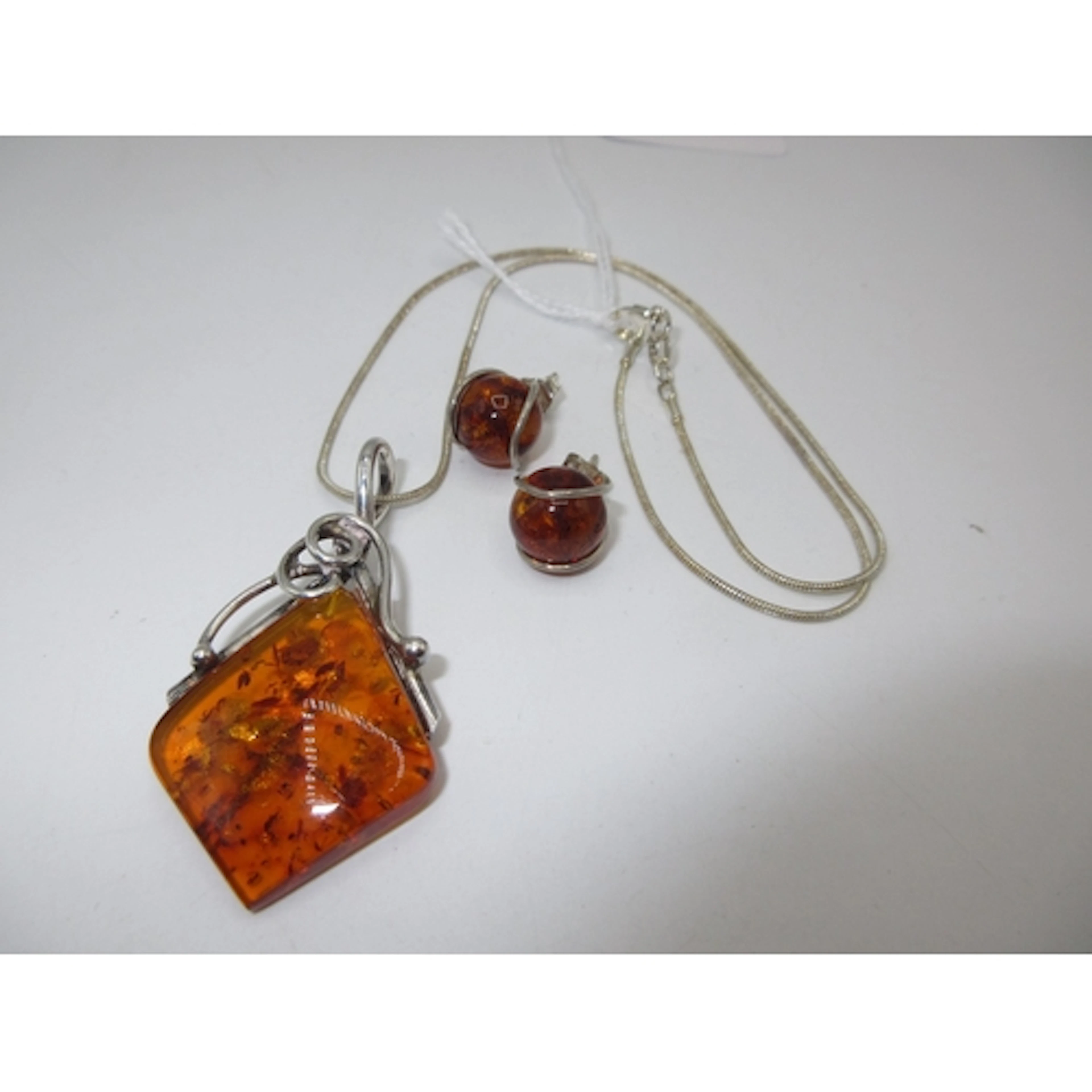 Silver and Amber Pendant with Chain and a Pair of Ear Studs
