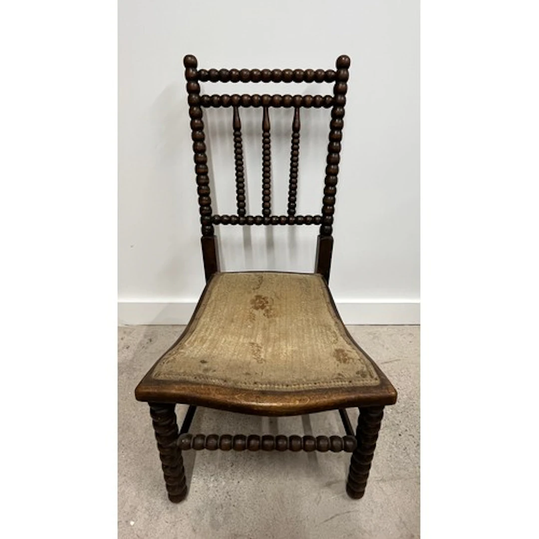 Arts and crafts style Victorian bobbin turned nursing chair.