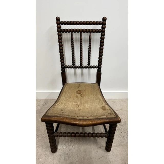 Arts and crafts style Victorian bobbin turned nursing chair.