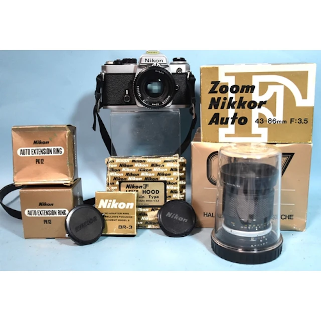 A Nikon FE SLR camera, chrome, serial number FE3231088, (shu...