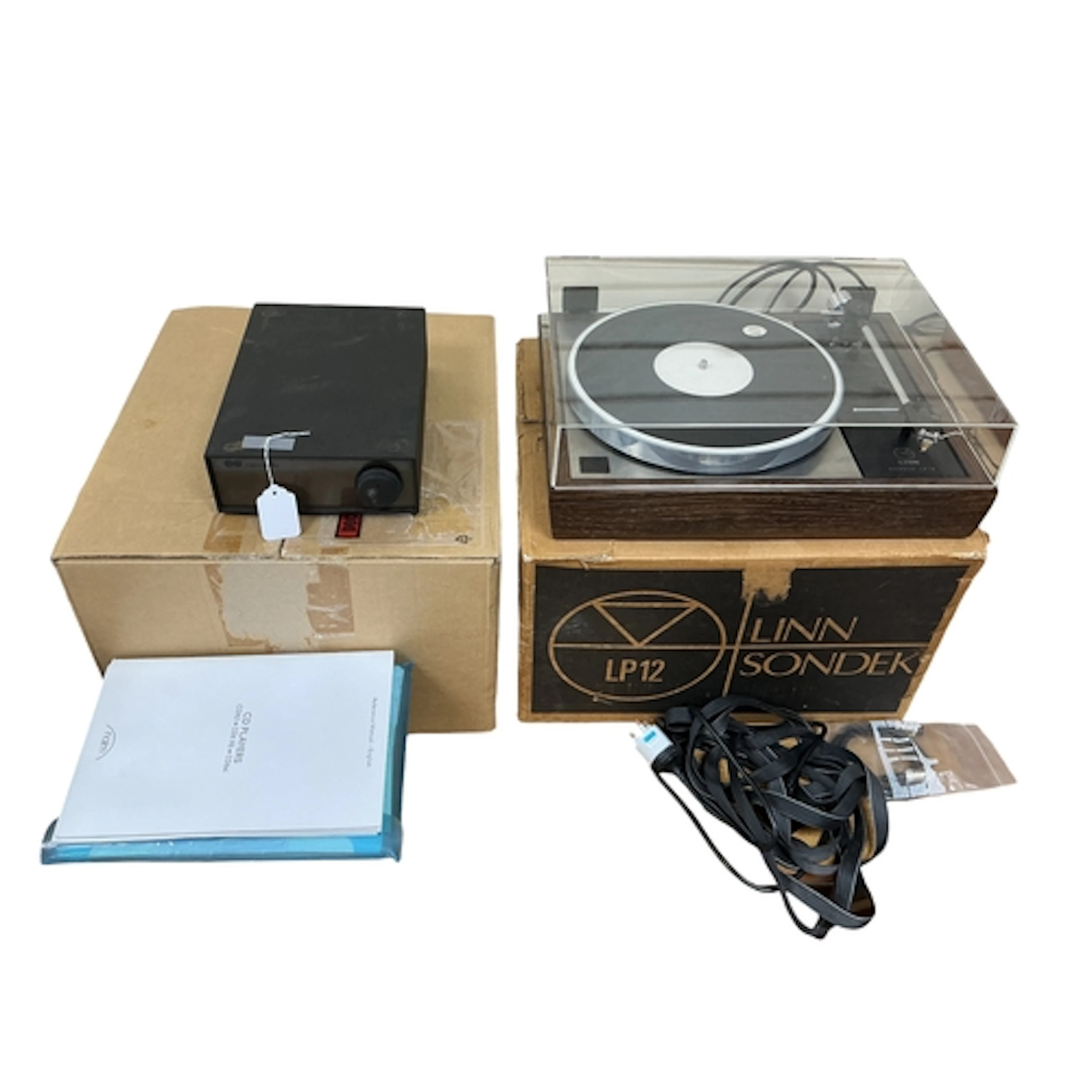 A boxed Linn Sondek LP12 record player turntable in walnut f...