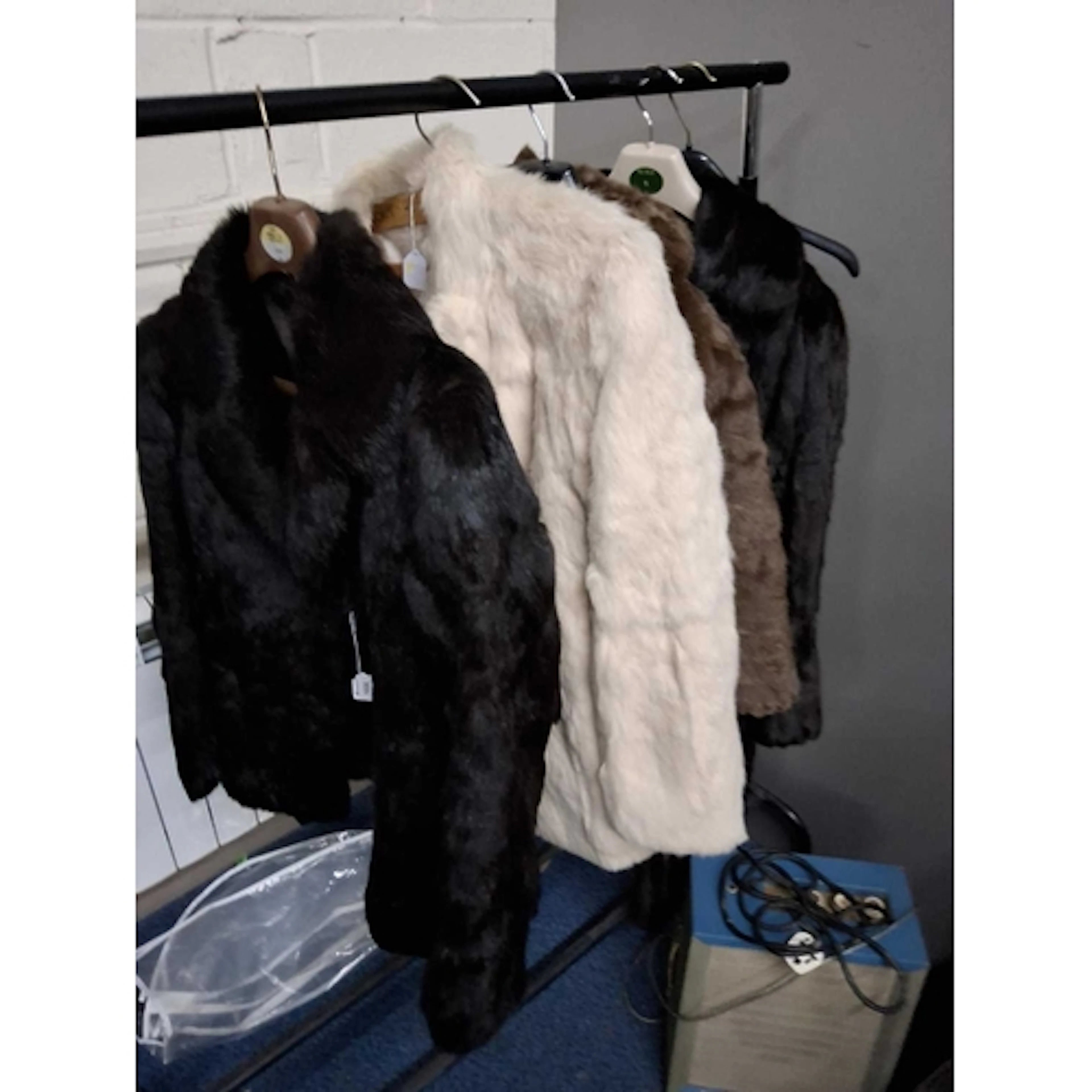 A GROUP OF FOUR FUR ITEMS, to include a black rabbit fur jac...