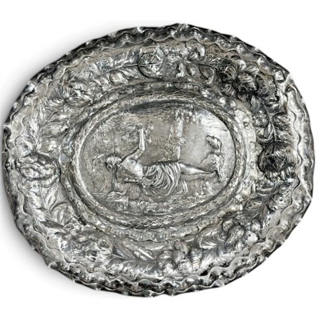 A large German repoussé silver dish or Schauplatte, Augsburg...