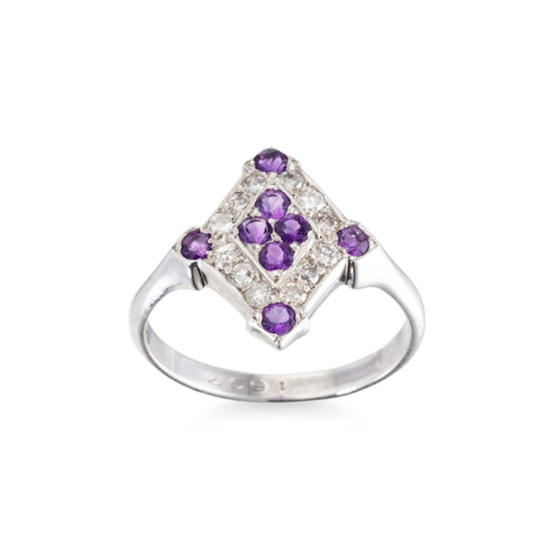 A DIAMOND AND AMETHYST CLUSTER RING, the round cut amethyst ...