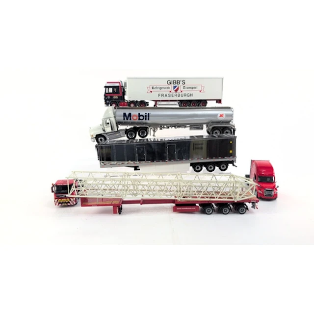 A group of die-cast articulated lorry models including Gibb’...