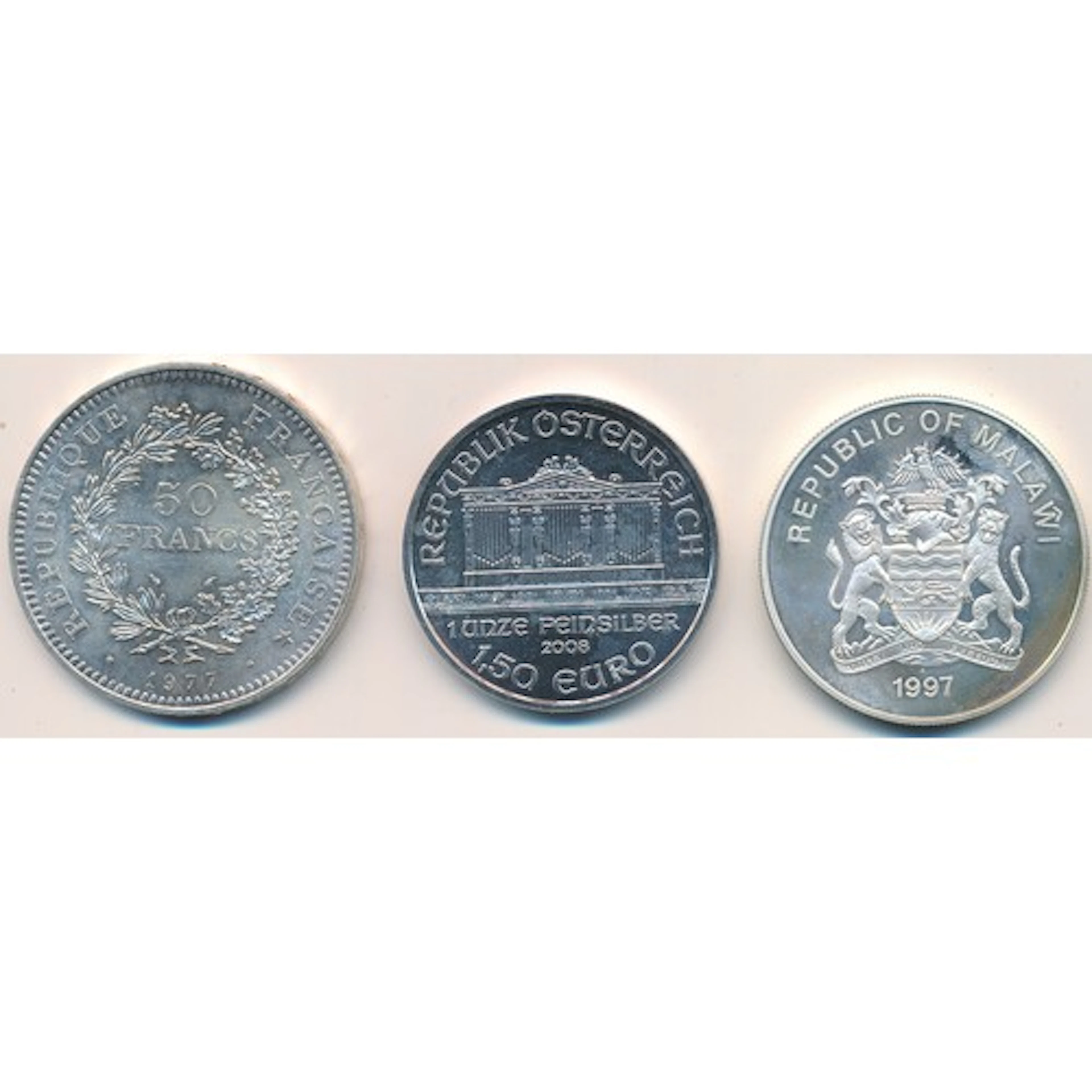 Trio of World silver coins with Austria 1.5 Euro 2008, Franc...
