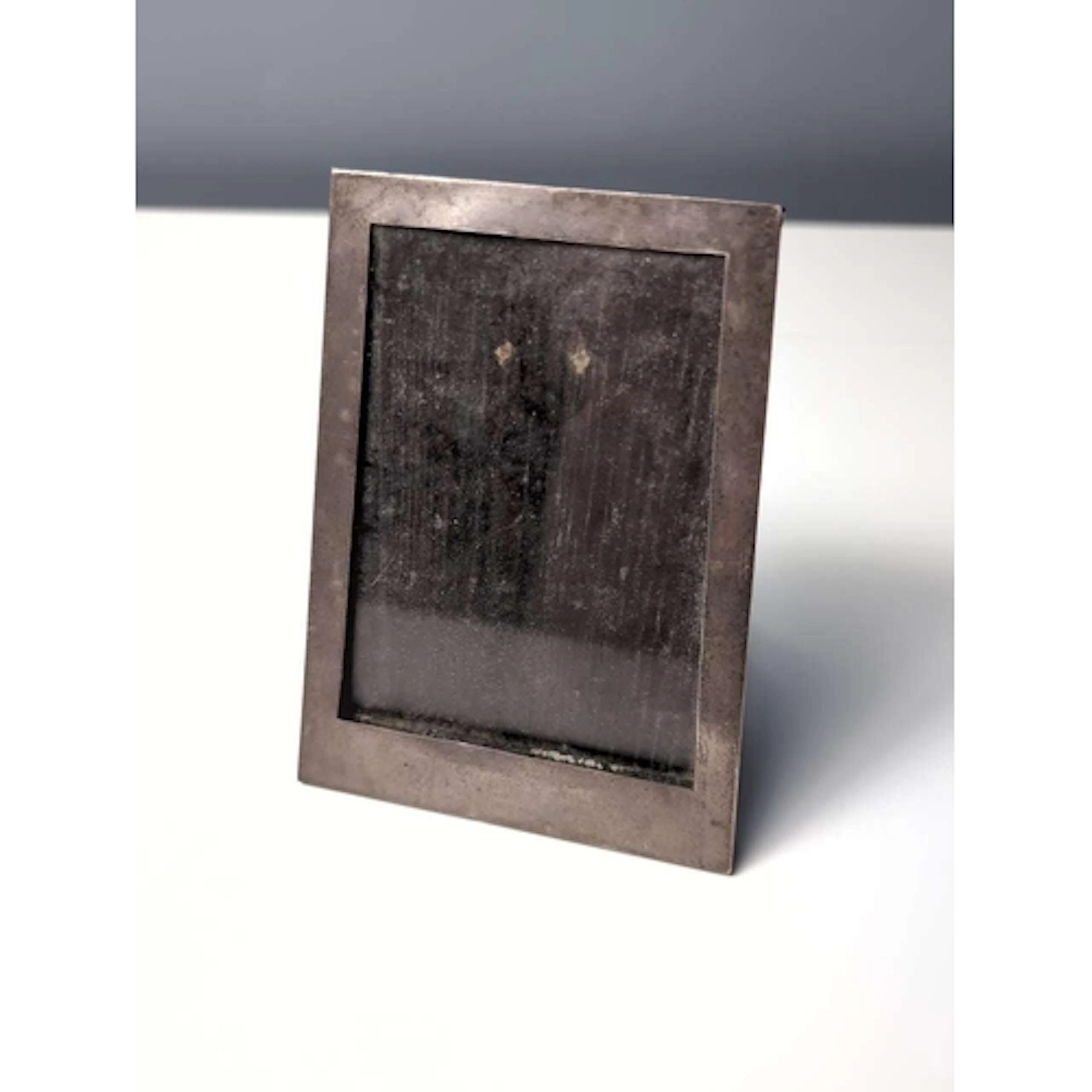Art Deco silver mounted trapezoid-shaped photo frame, J W Ti...