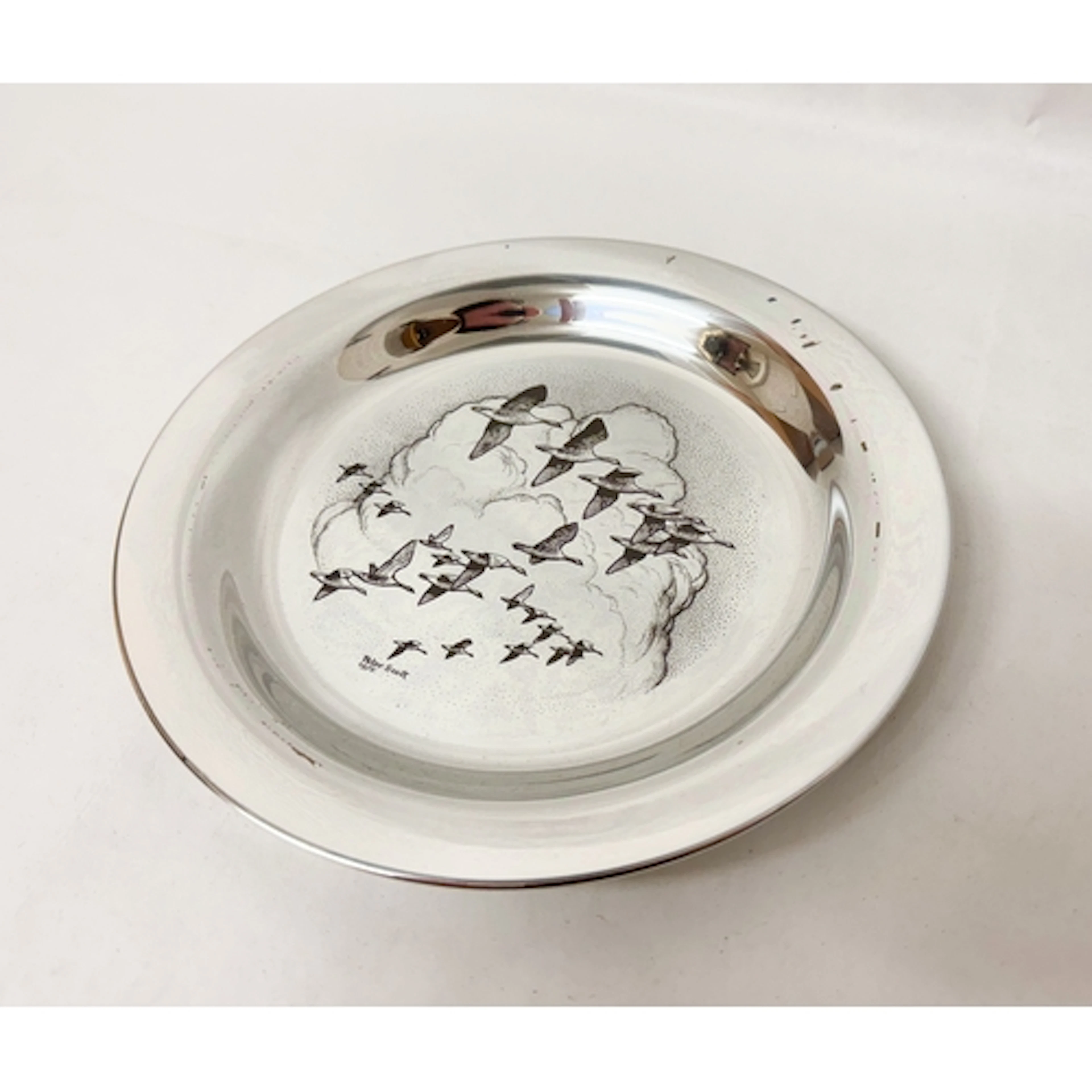 A silver 1975 Peter Scott Christmas plate by John Pinches, f...