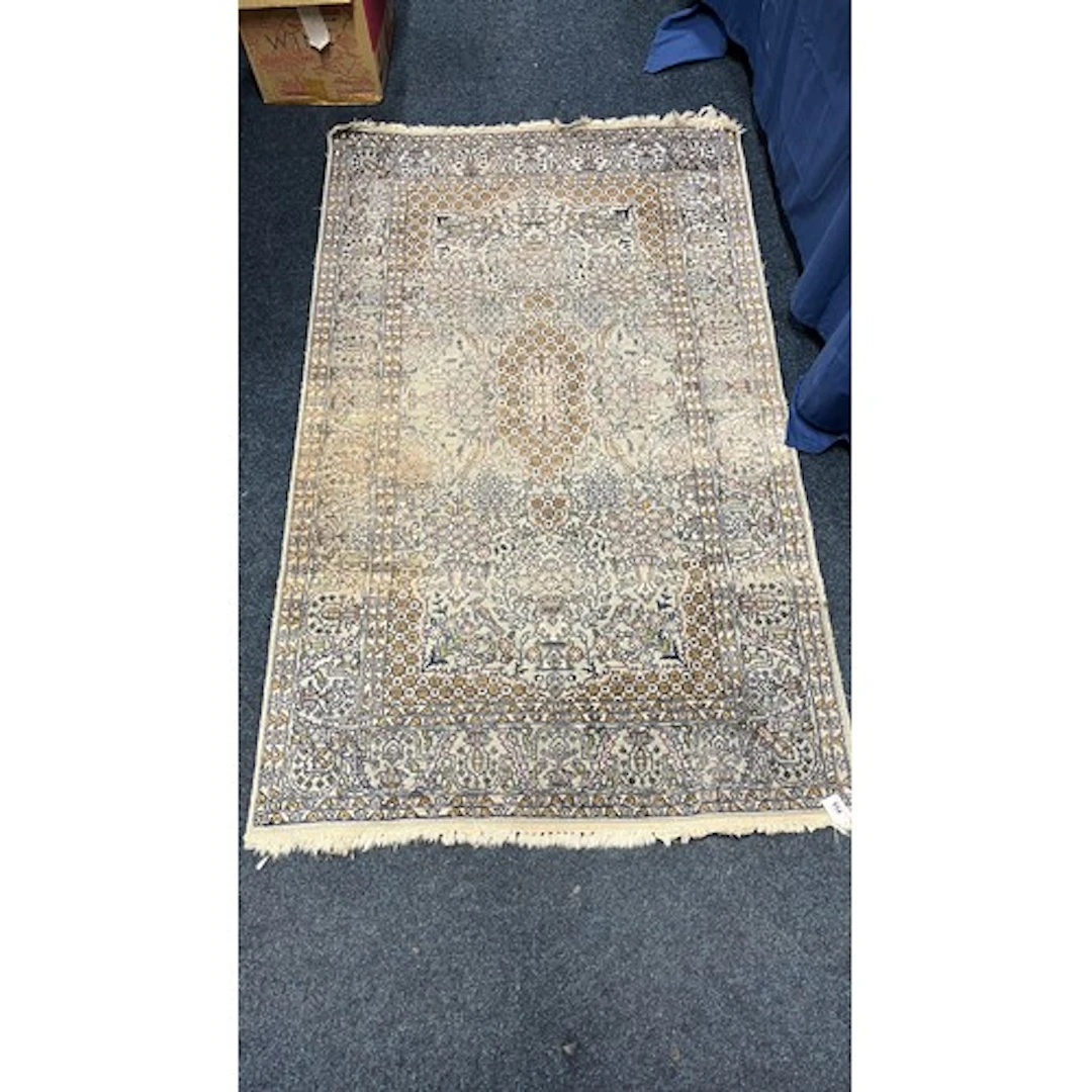 Eastern pale blue ground silk and wool rug, the field decora...