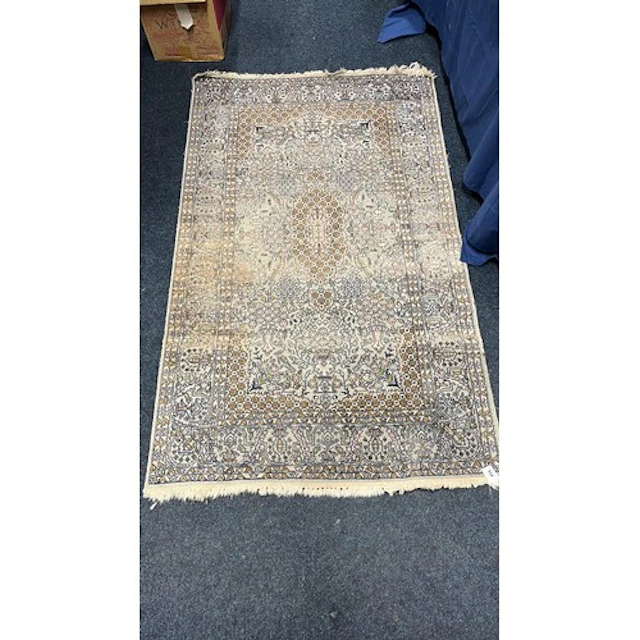 Eastern pale blue ground silk and wool rug, the field decora...