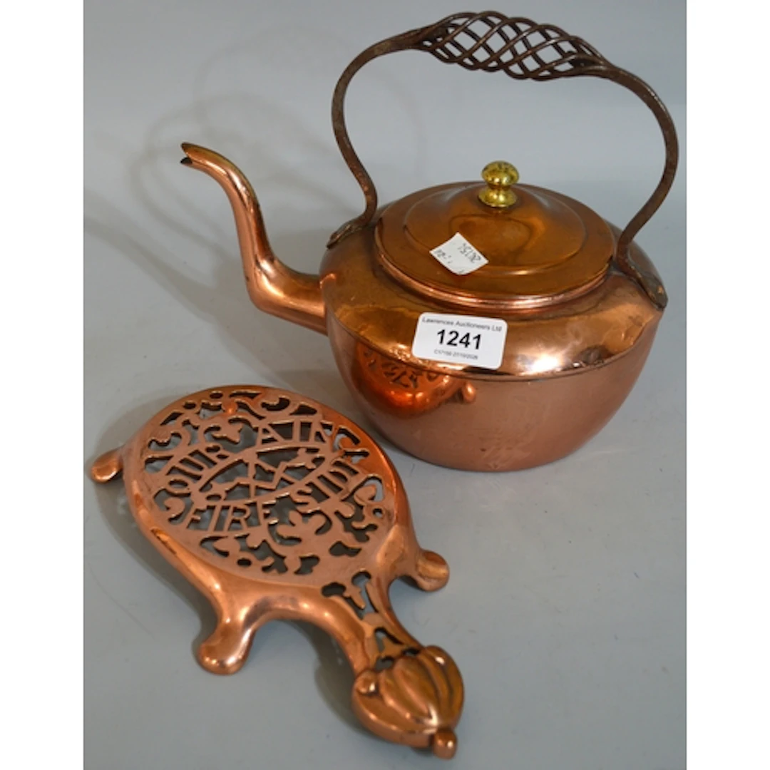 Copper kettle and a brass trivet, with Masonic emblem