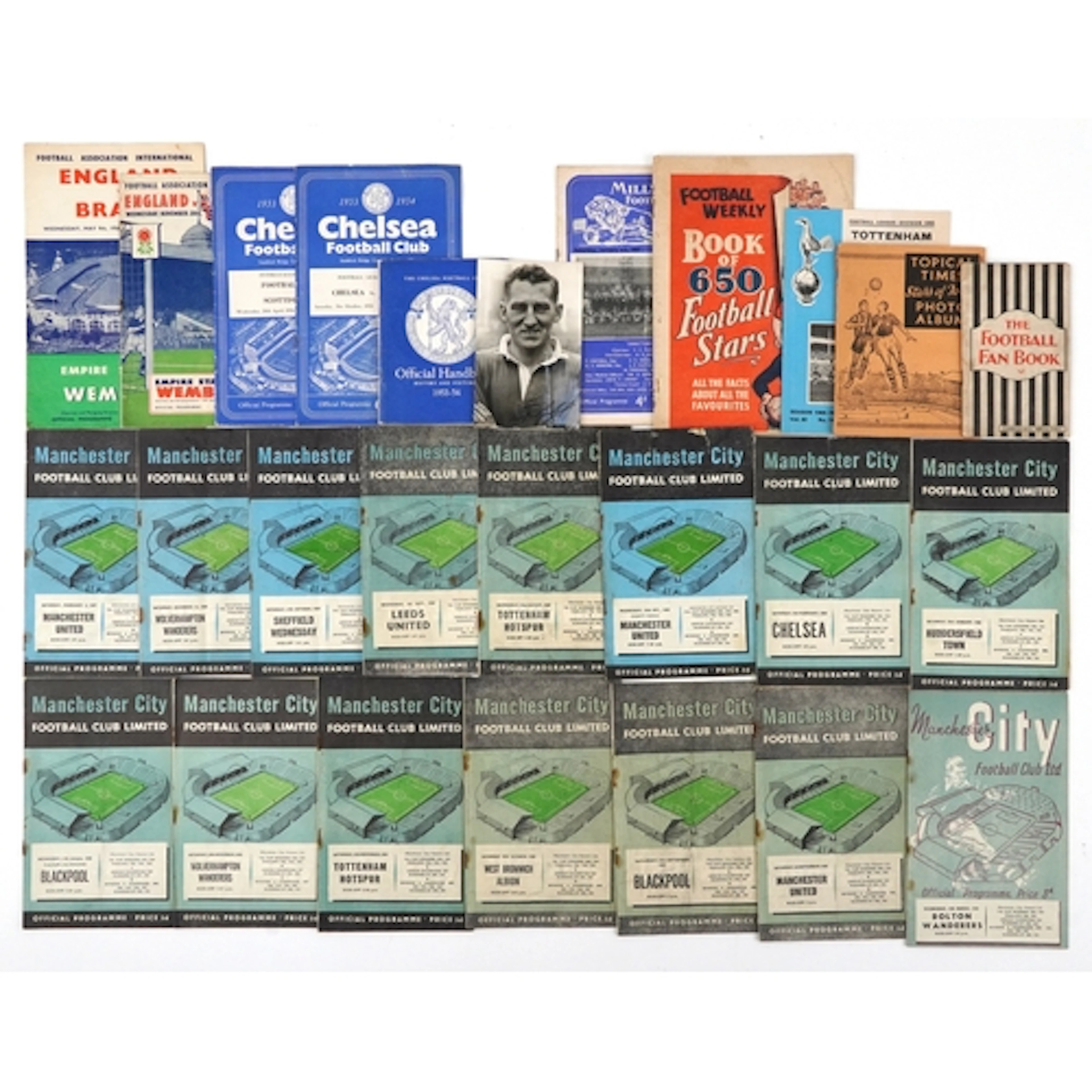 Quantity of football programmes, predominantly Manchester Ci...