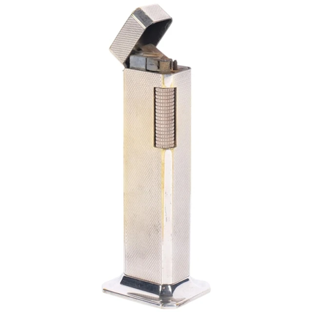 DUNHILL - an engine turned silver plated tallboy table light...