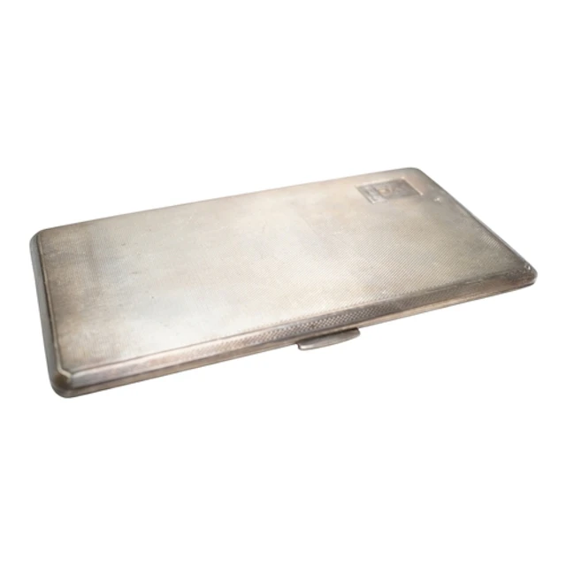 A George VI engine turned silver cigarette case, Birmingham...
