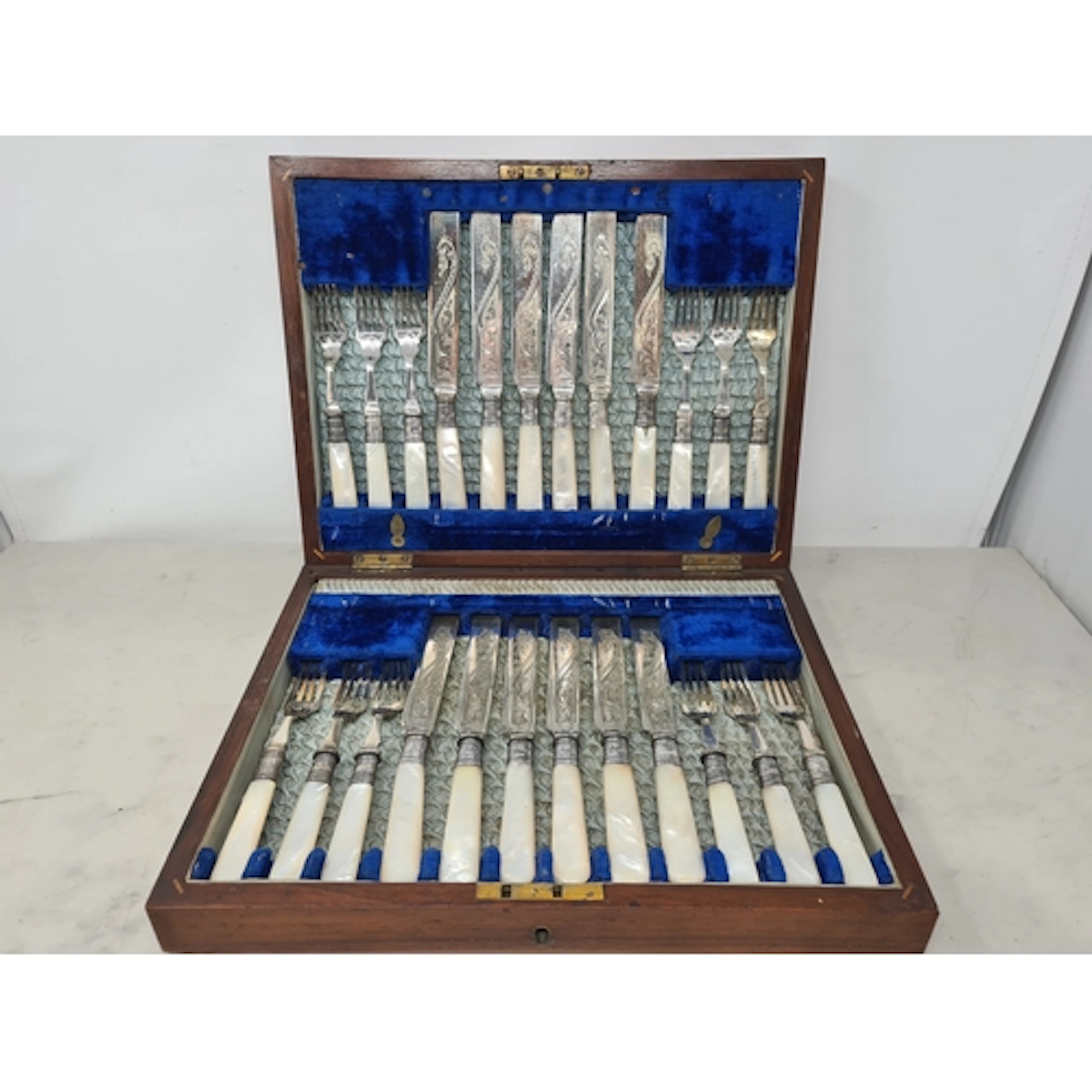 One dozen Victorian silver mounted Dessert Knives and forks ...