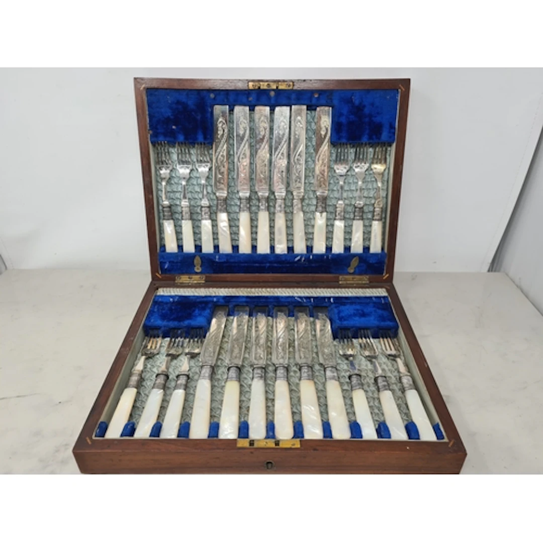One dozen Victorian silver mounted Dessert Knives and forks ...
