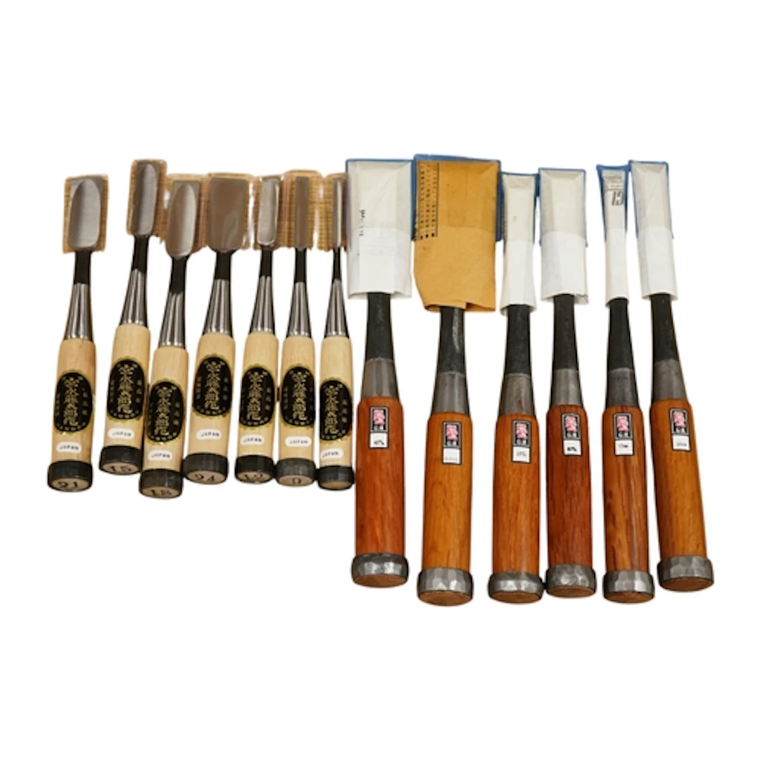 Two sets of Japanese bevel edge chisels and mortise chisels;...