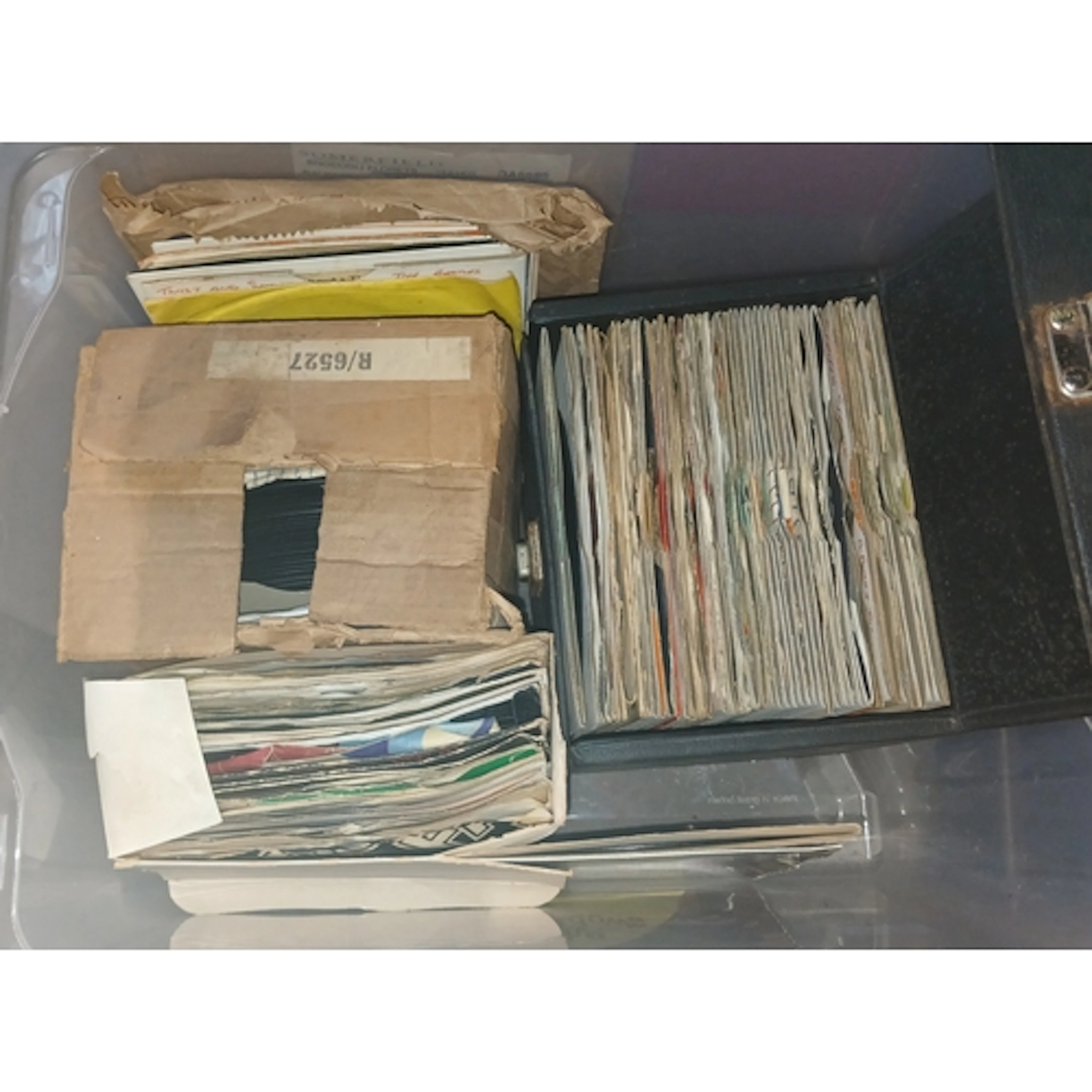 A box of assorted 7" singles, circa 1960s and later.