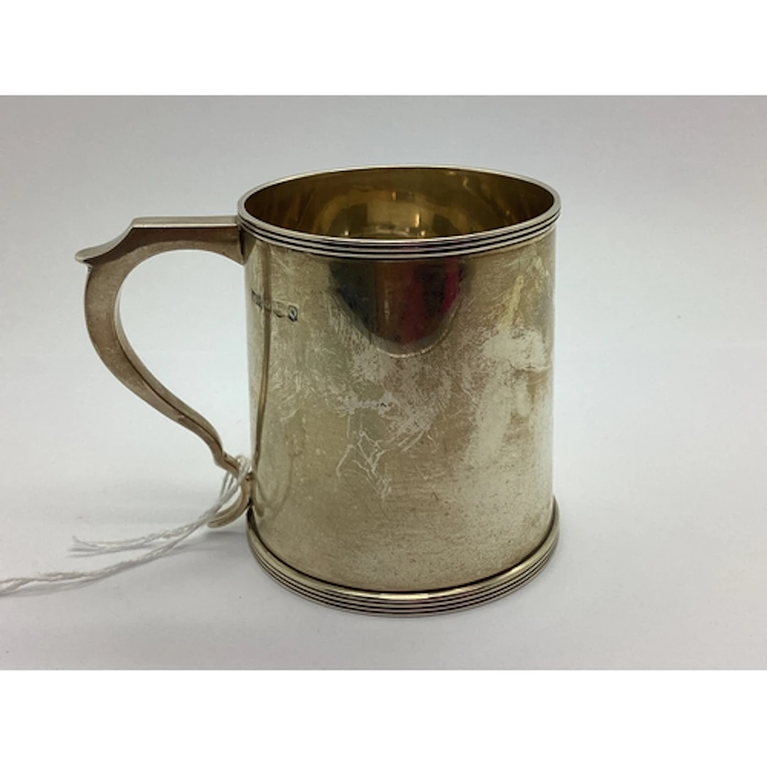 A Hallmarked Silver Mug, Walker & Hall, Sheffield 1958, of p...