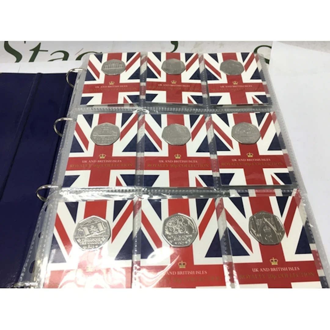 A change checker folder containing various commemorative 50p...