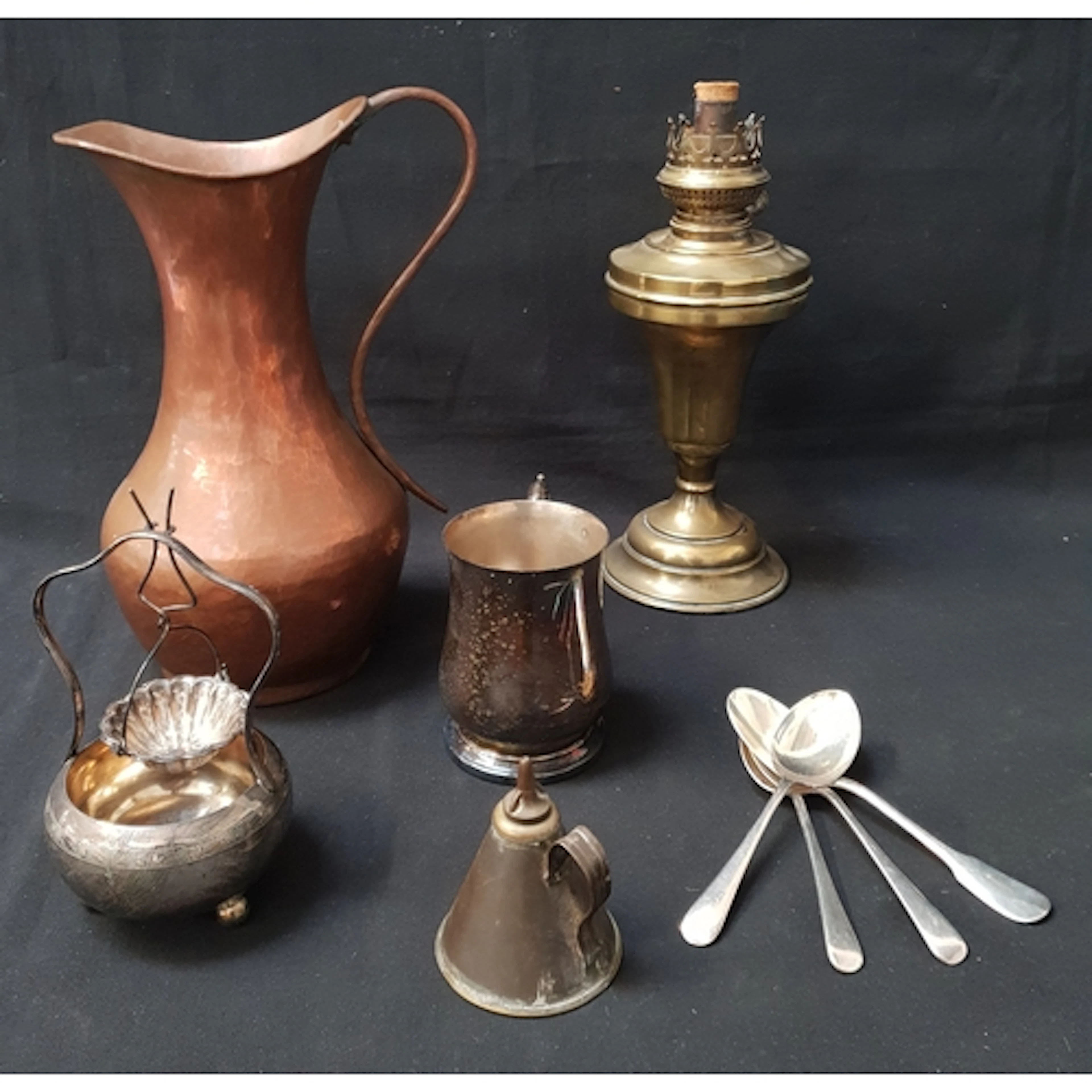 SELECTION OF CAST METAL ITEMS including a copper ewer, four...
