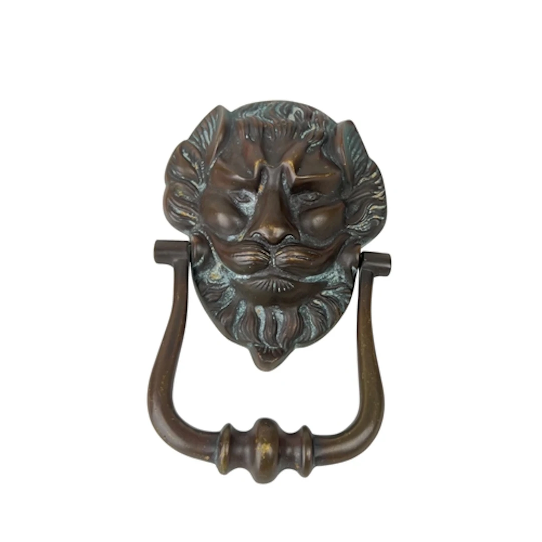 AN IRISH GEORGIAN BRASS DOOR KNOCKER, IN THE FORM OF A LION ...