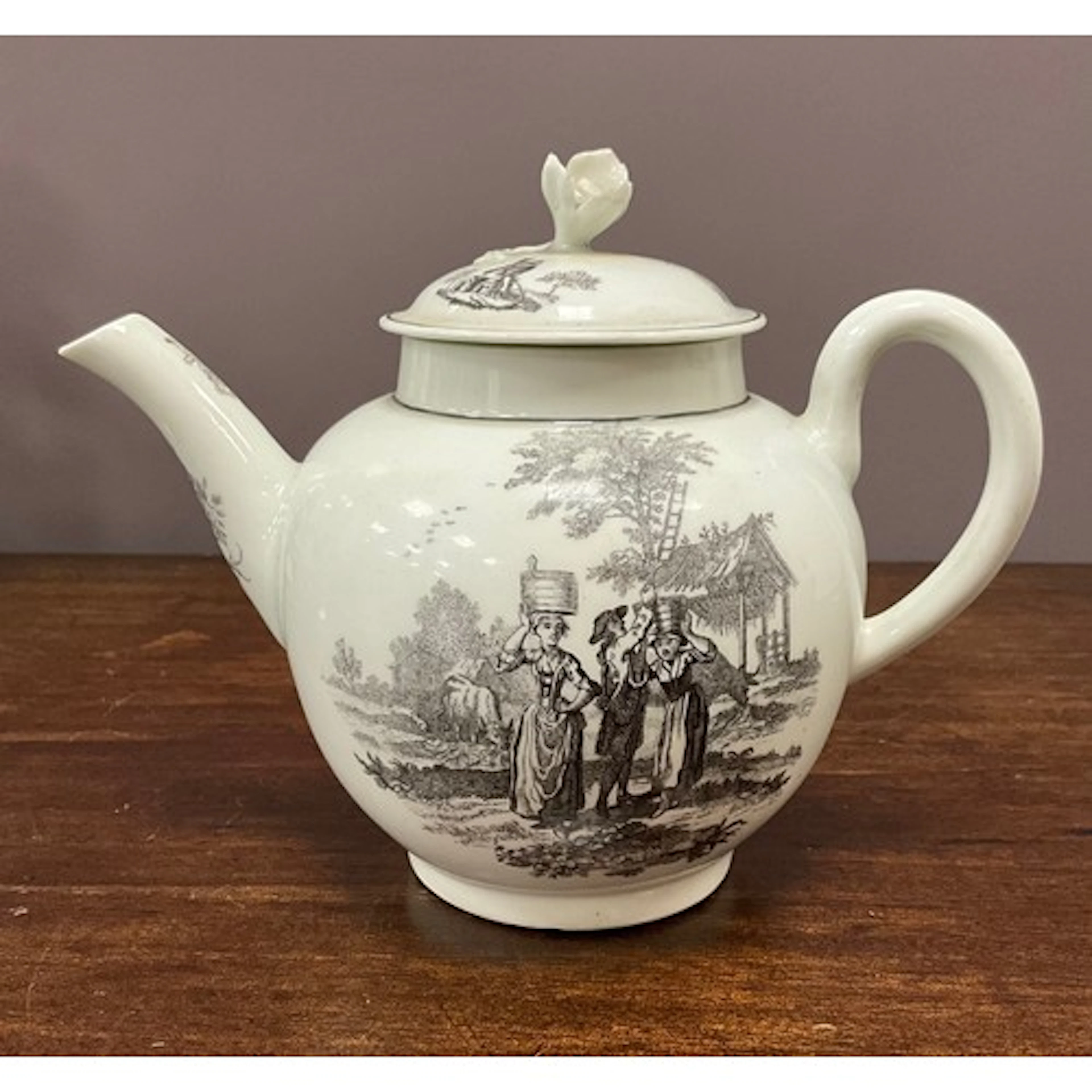 A 18th century Worcester teapot and cover printed with Milkm...