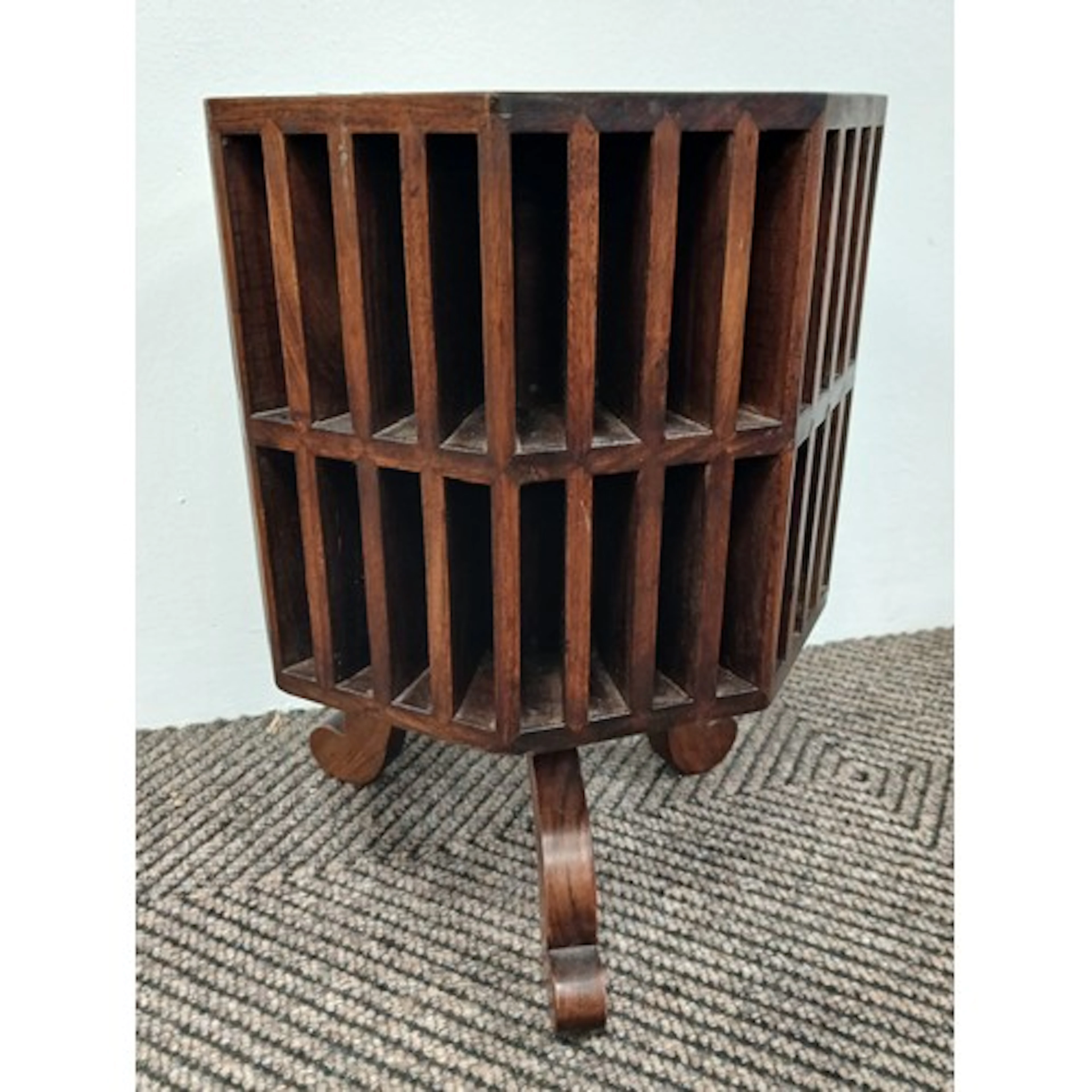 Octagonal brass inlaid revolving table.