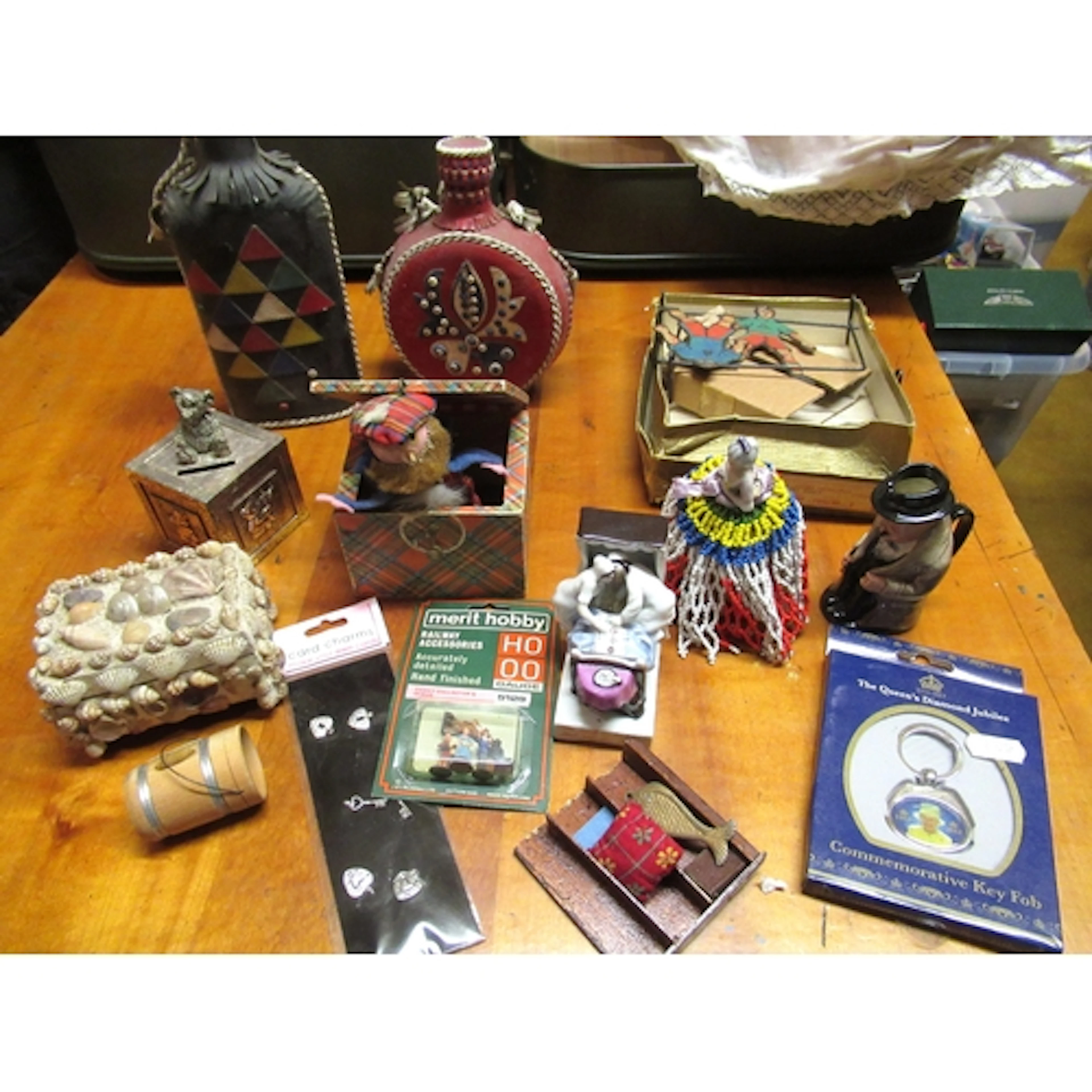 Box of miscellaneous collectables, including a tartan ware j...
